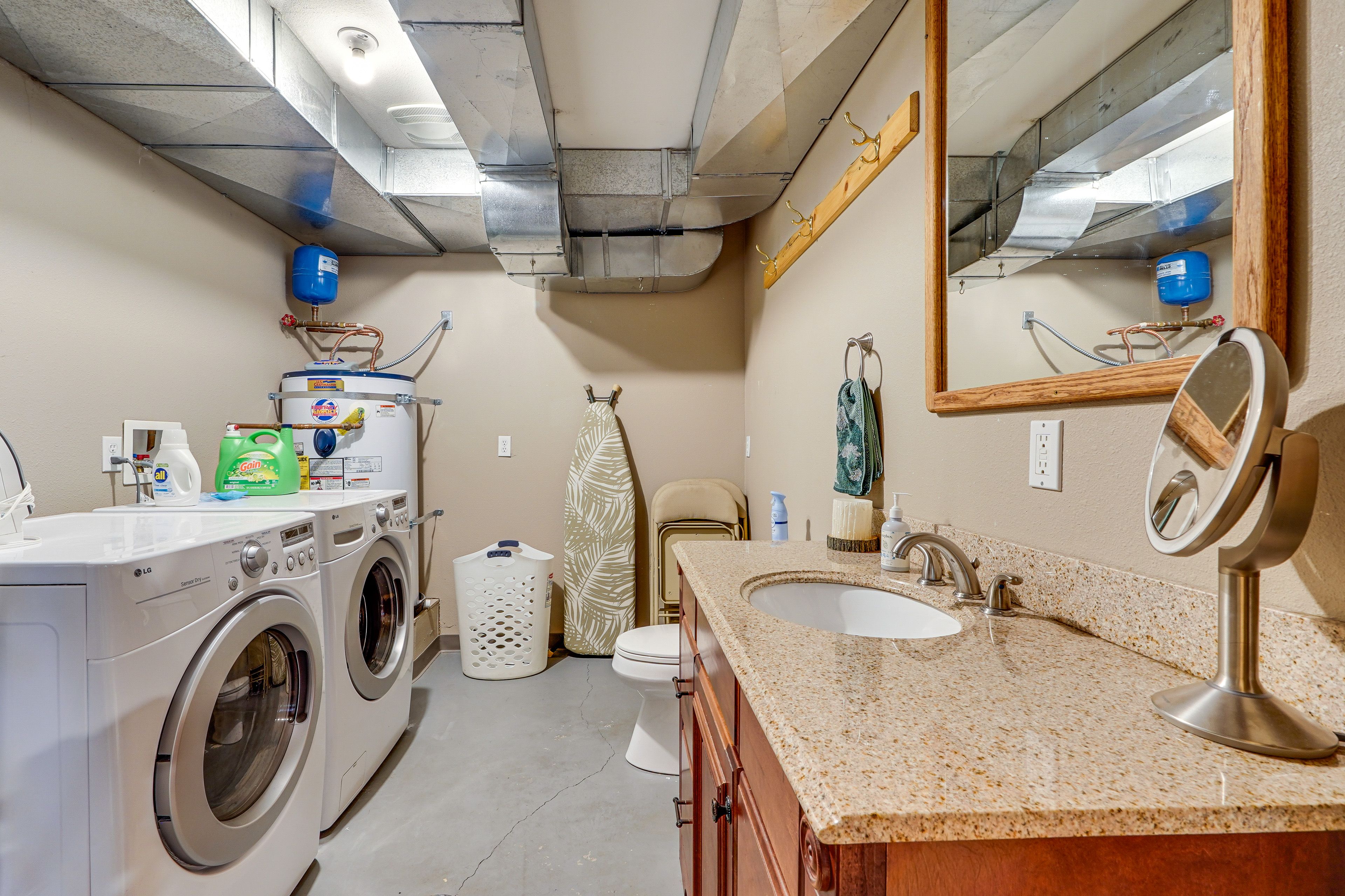 Half Bathroom | Laundry Area | Lower Level