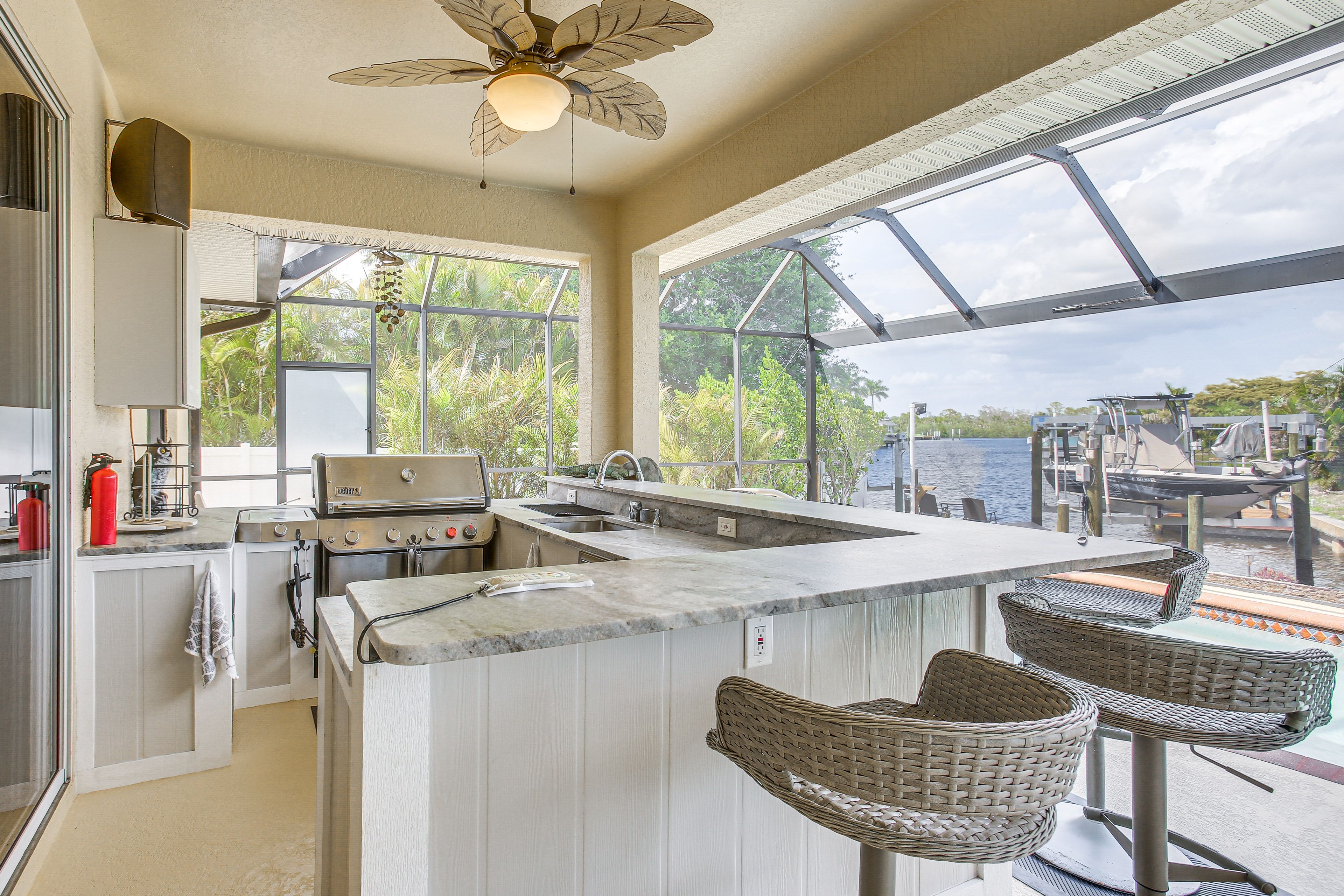 Outdoor Kitchen | Screened Lanai | Private Pool | Canal Views