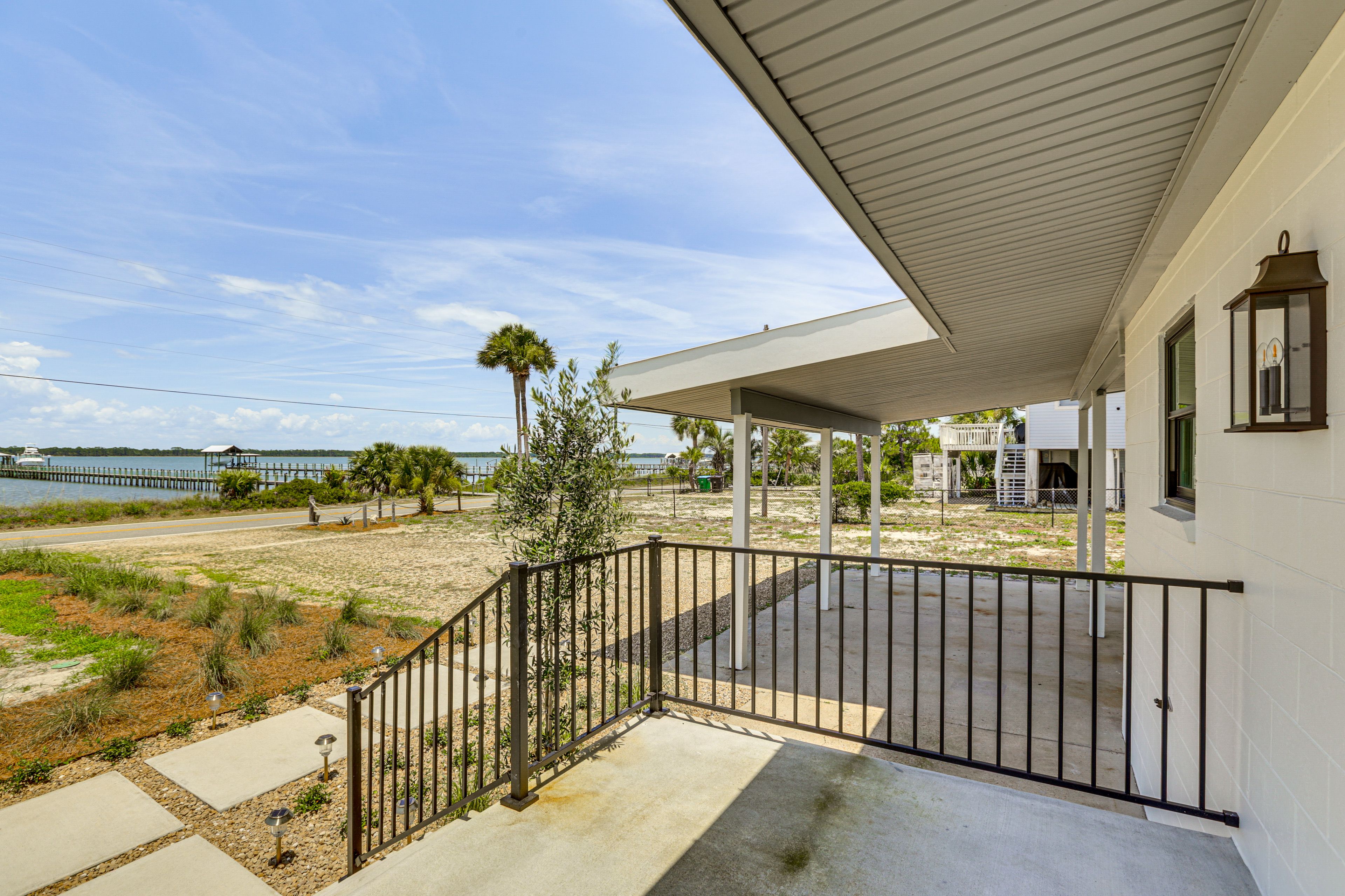 Exterior | Ample Parking Between Carport & Driveway