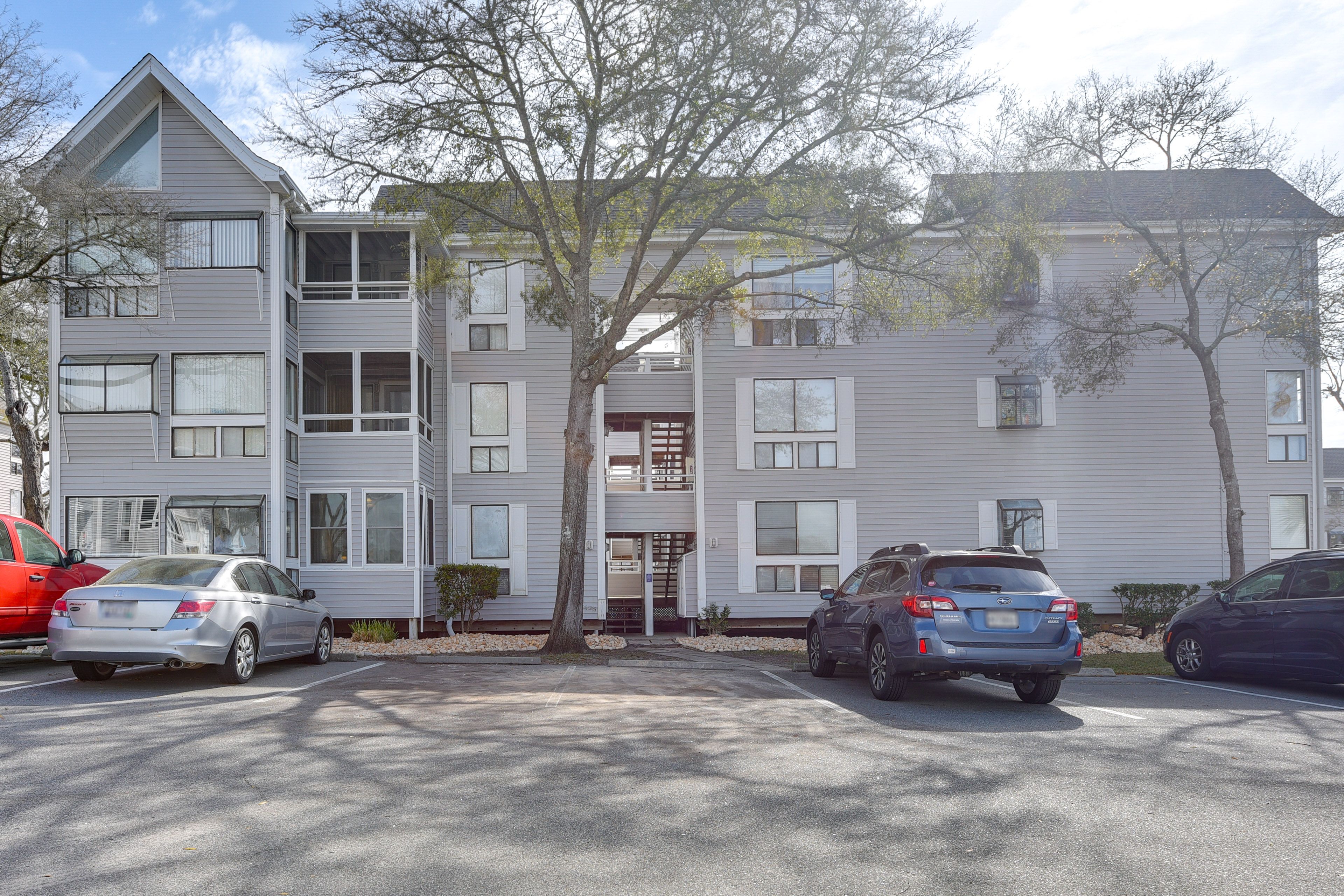 Building Exterior | Community Lot (1 Vehicle)