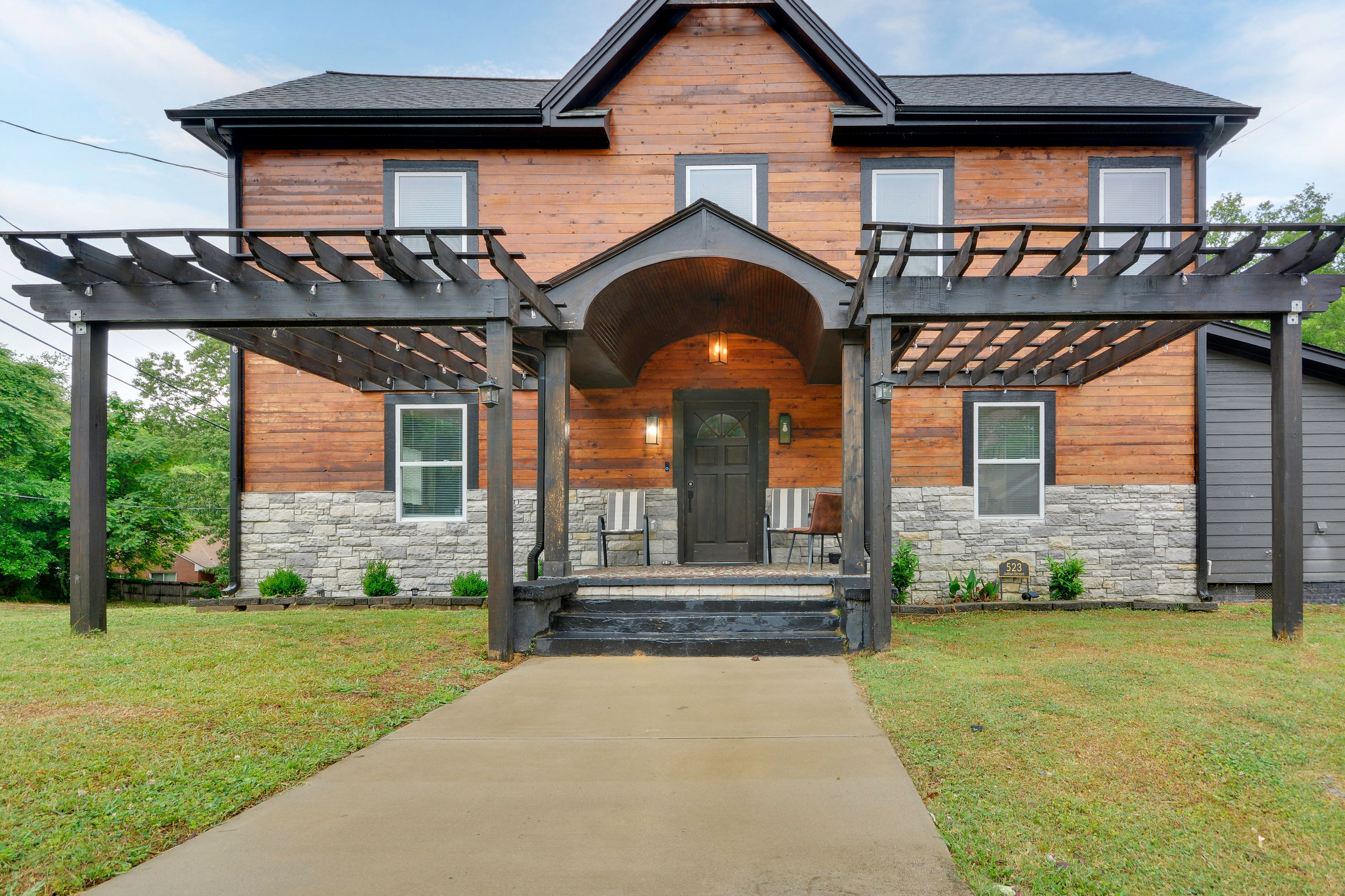 Property Exterior | 2-Story Home | Deck w/ Seating
