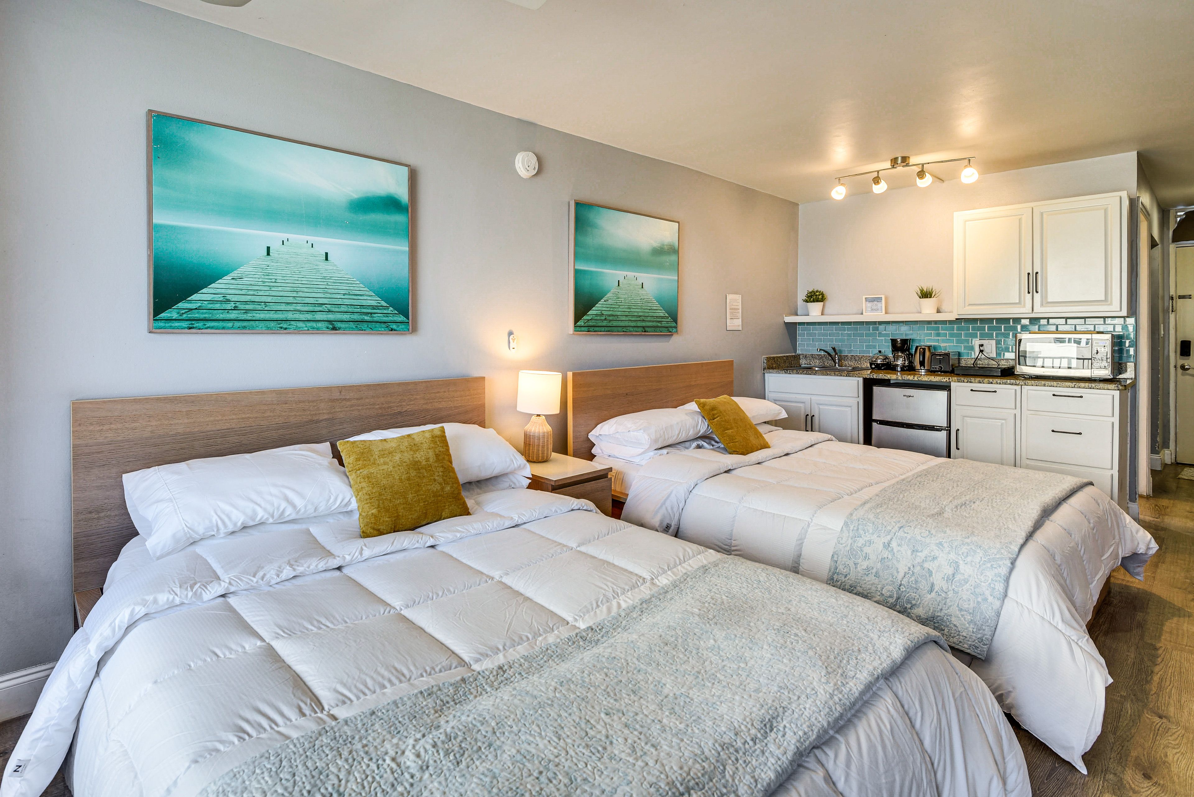 Studio | Sleeping & Living Area | 2 Queen Beds