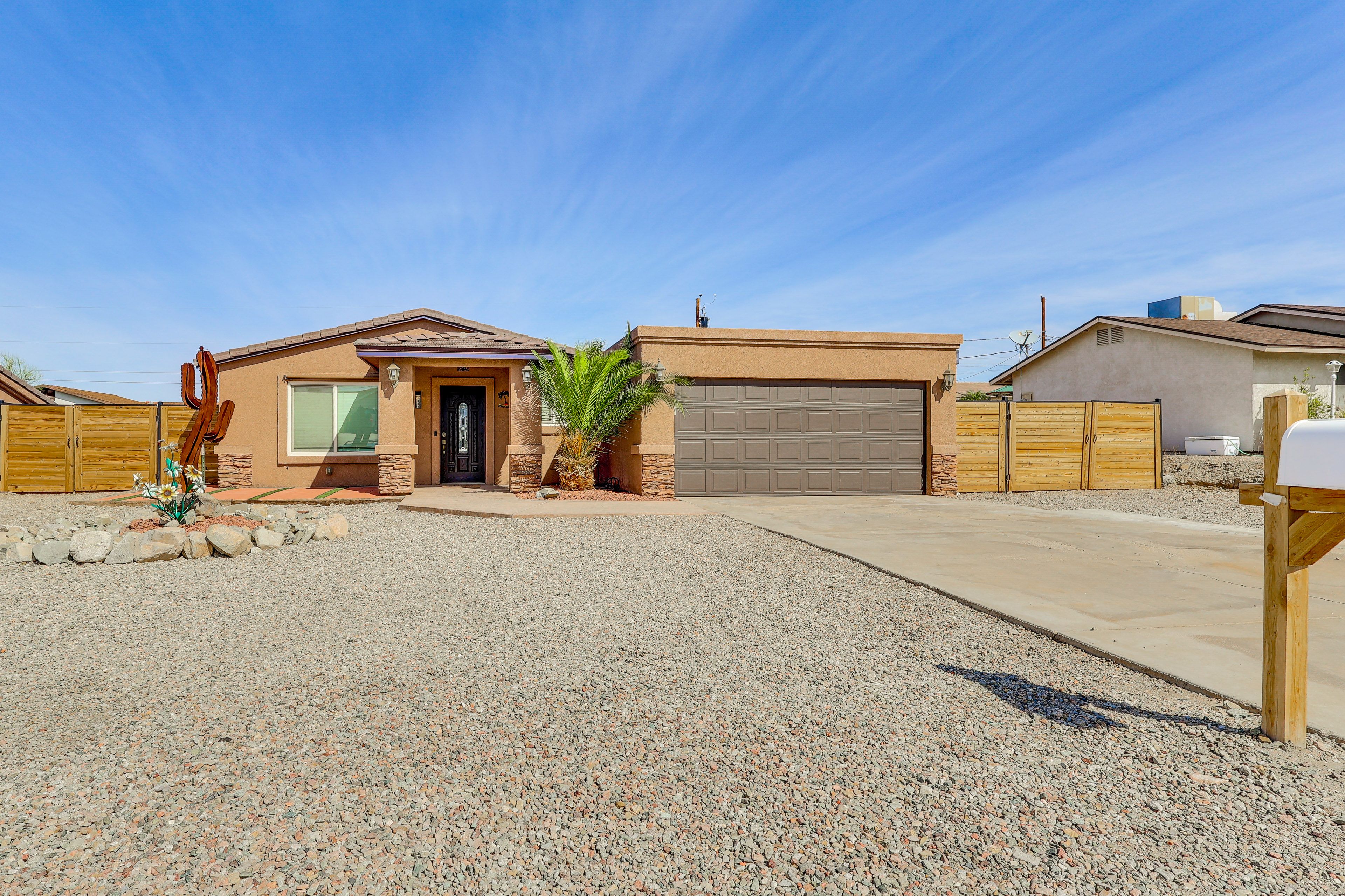 House Exterior | Driveway (3 Vehicles) | Gravel Parking Pad