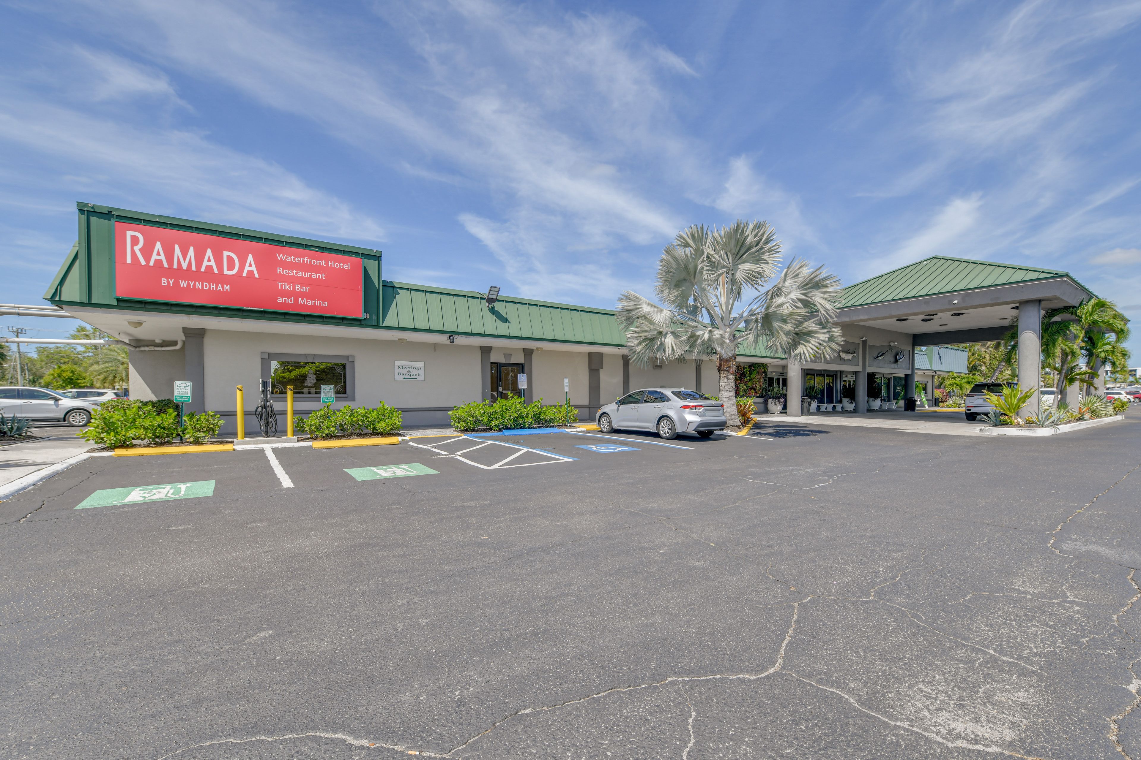 Property Exterior | Parking | Open Parking Lot (First-Come, First-Served)