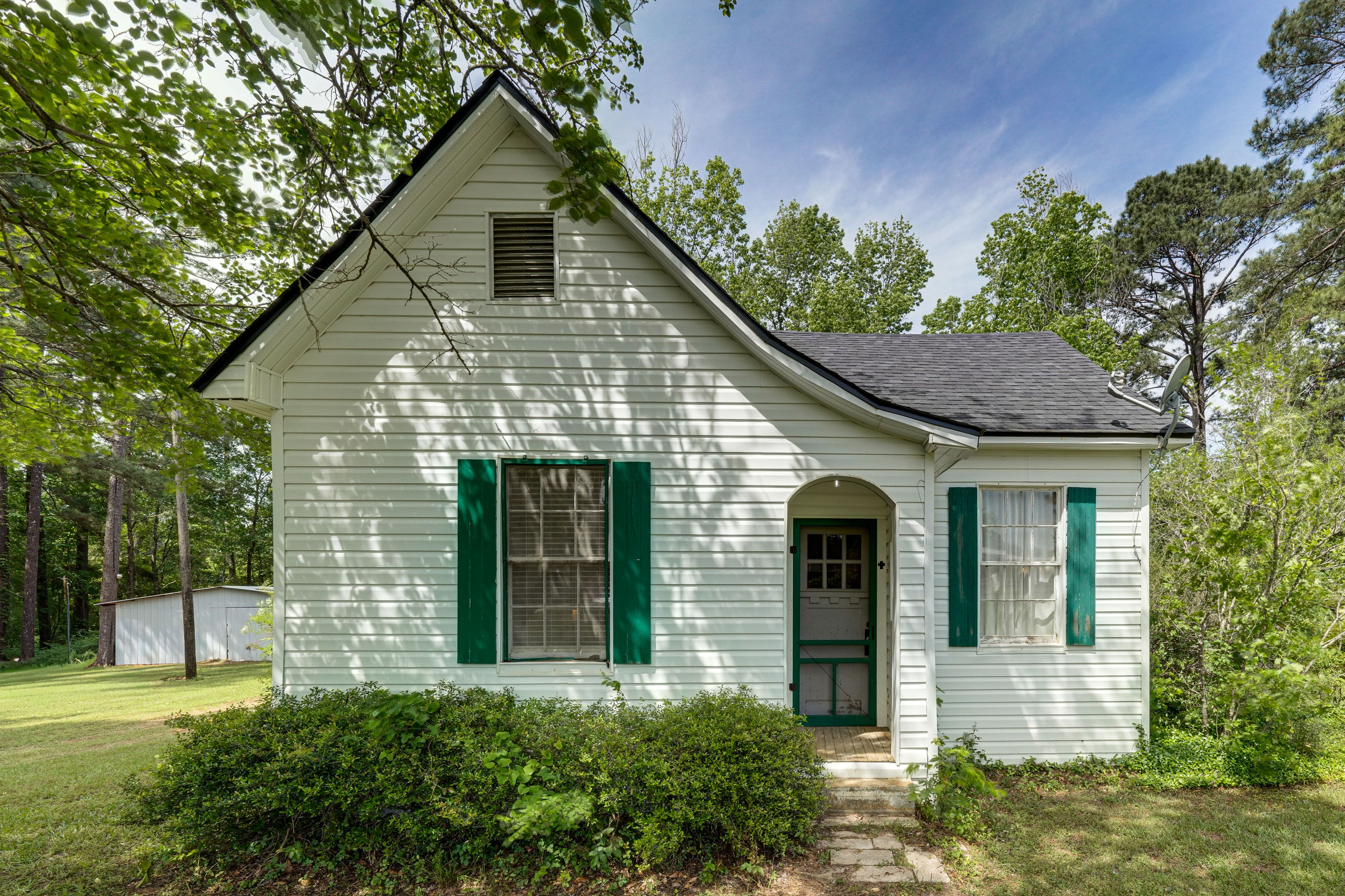 Property Exterior | Spacious Yard | Quiet Surroundings