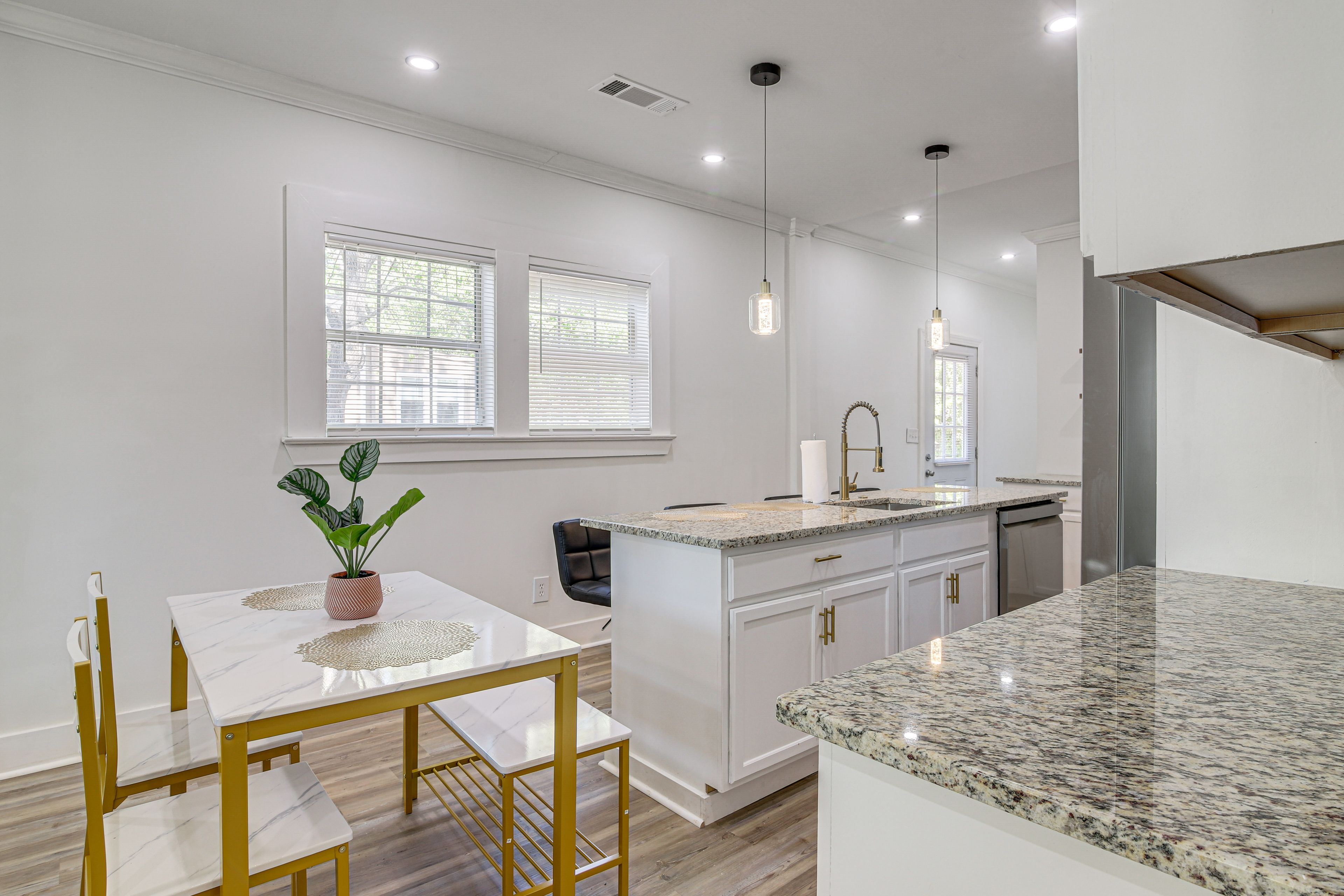 Kitchen & Dining Area | Open Floor Plan | Central Heating & A/C