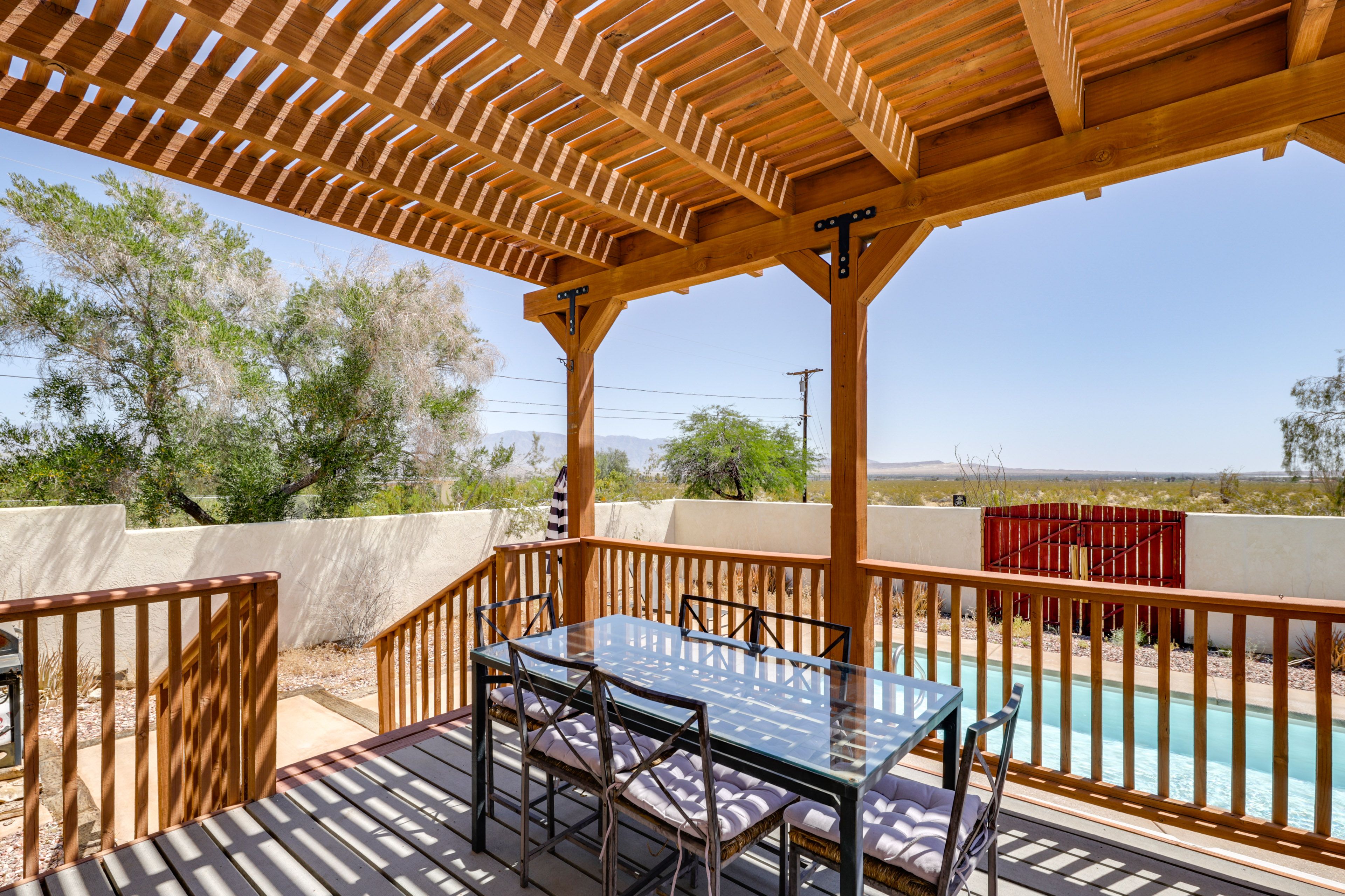 Deck w/ Pergola | Dining Area | Sunrise & Mountain Views