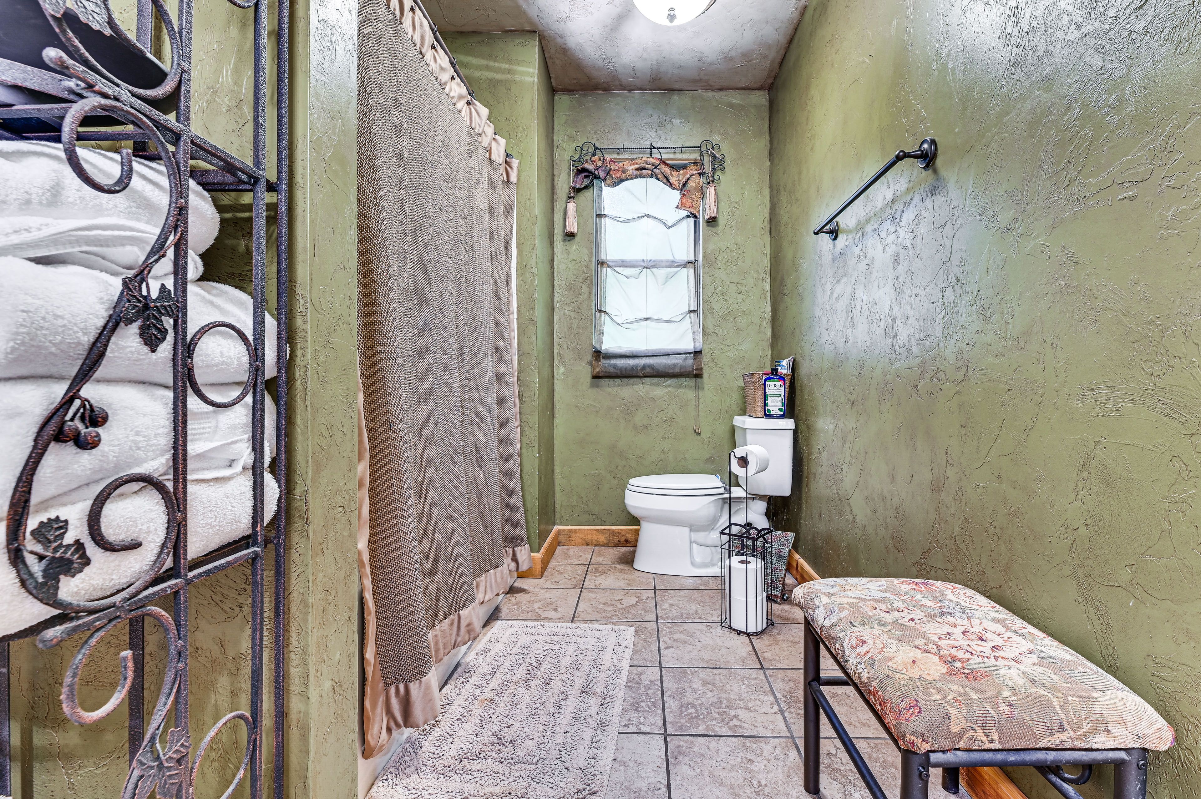 En-Suite Bathroom | Towels & Linens Provided