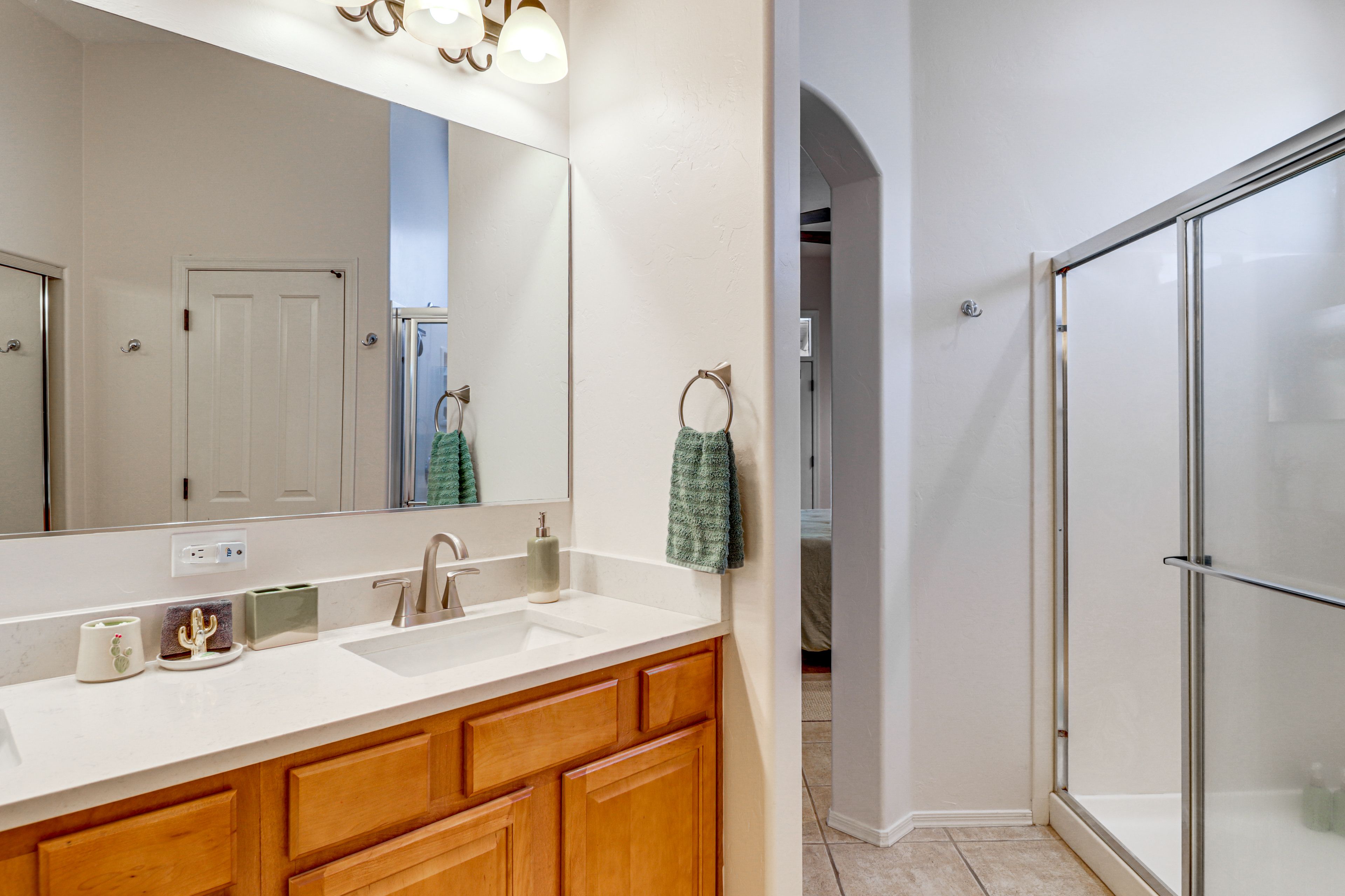 En-Suite Bathroom | Towels & Linens Provided