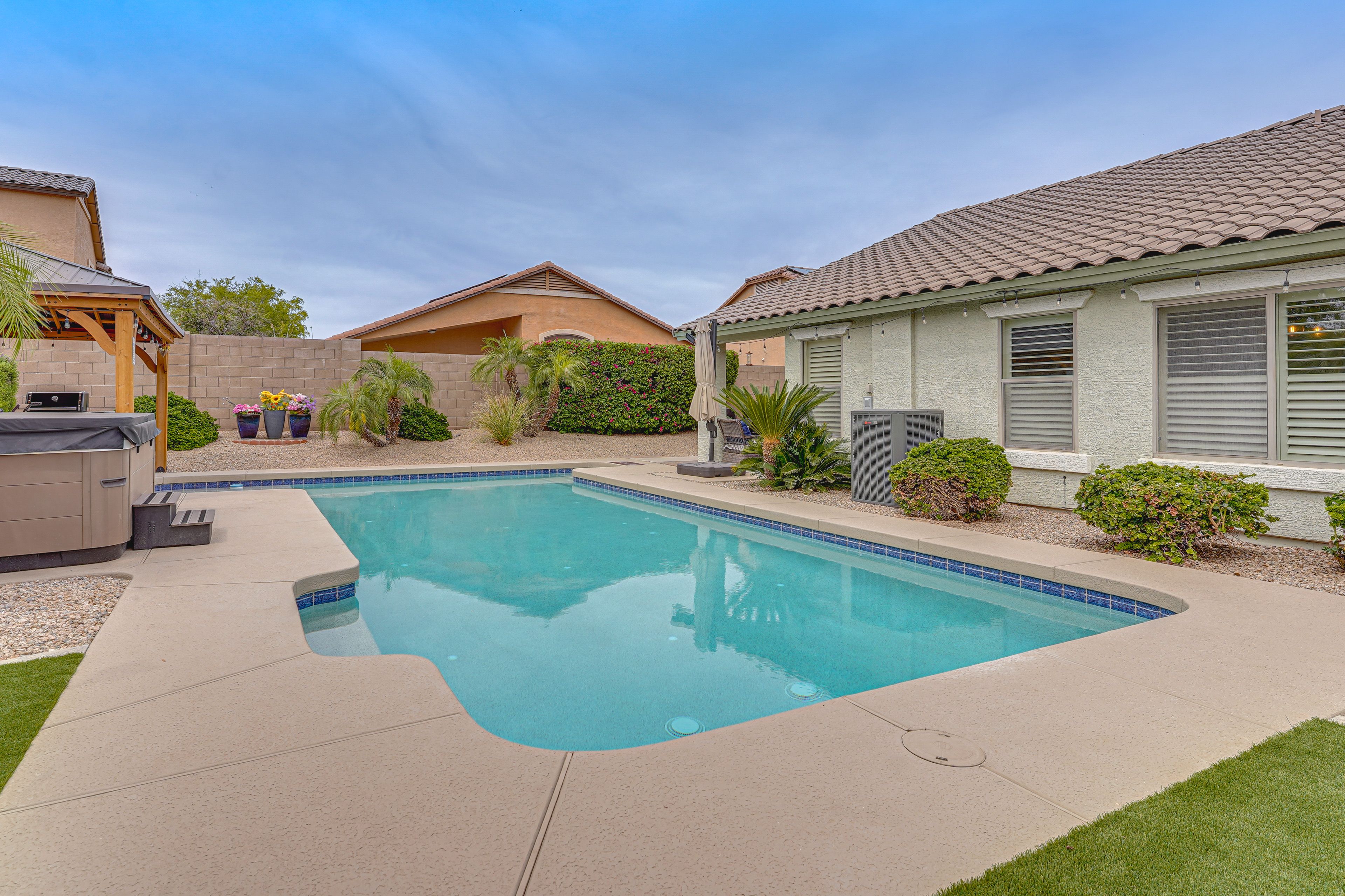 Goodyear Vacation Rental | 4BR | 2BA | 2,313 Sq Ft | 1 Step to Enter
