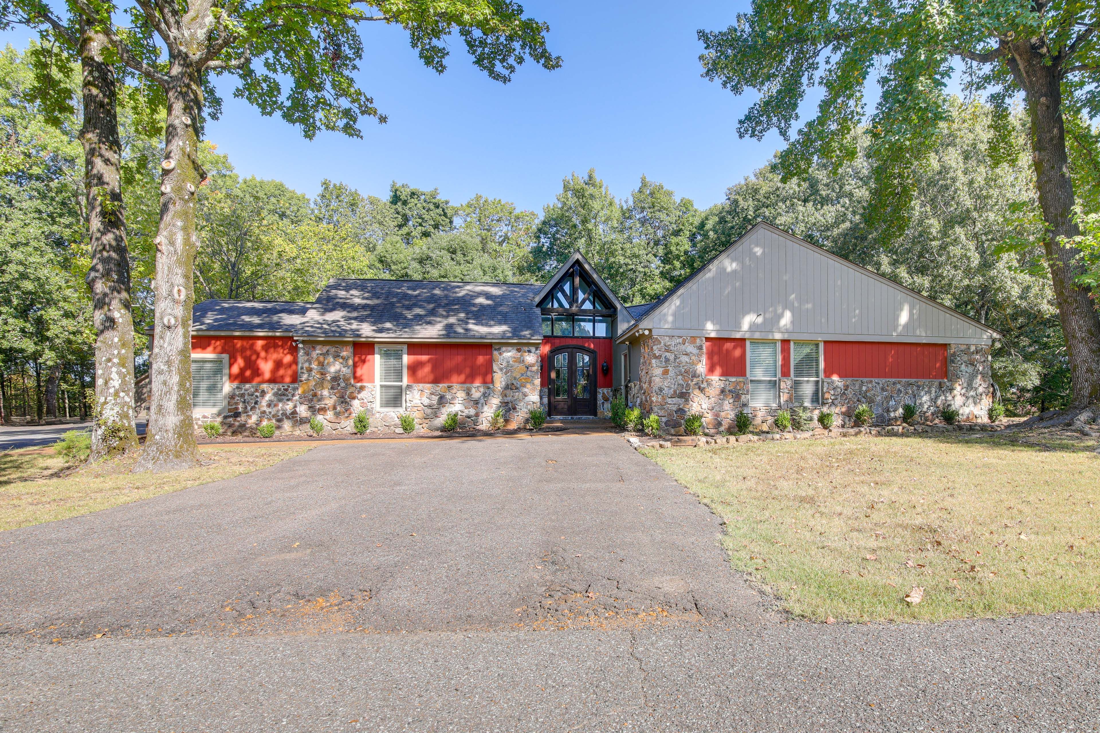 The Lodge Exterior | Ample Driveway Parking | 0.2 Mi Away