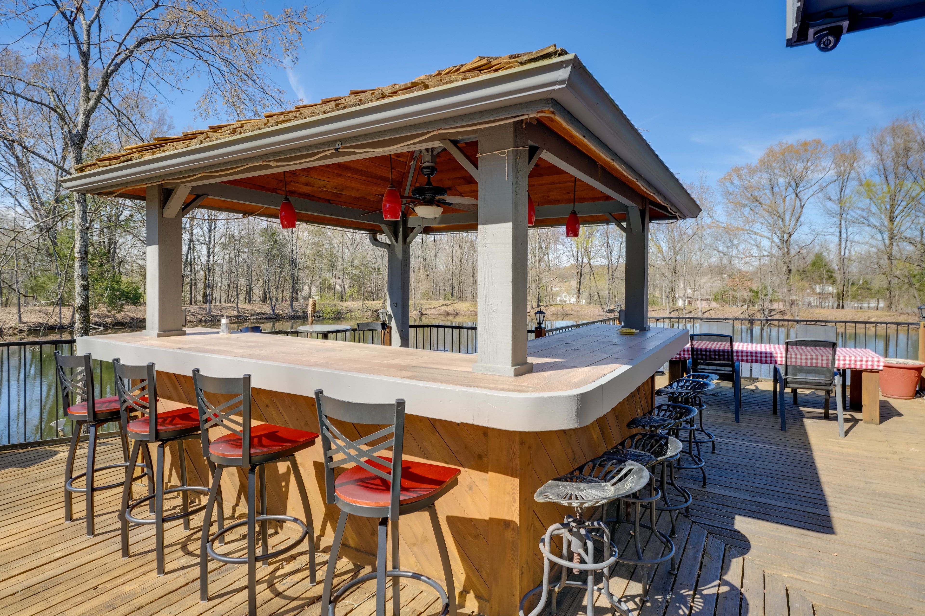 Spitfire Acres Exterior | 5,000 Sq Ft Deck | On-Site Pond