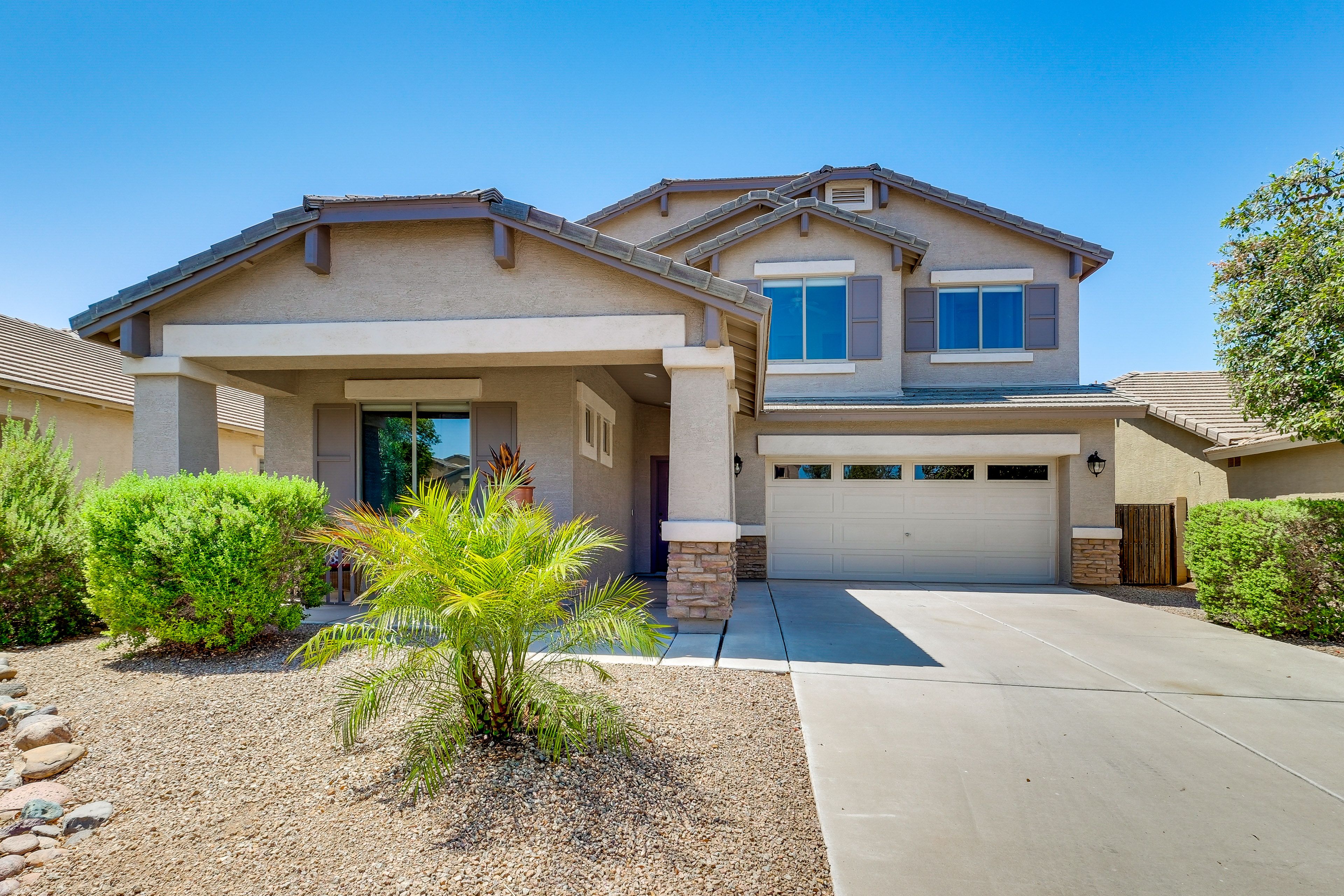 Exterior | 2-Story Home | Garage & Driveway Parking