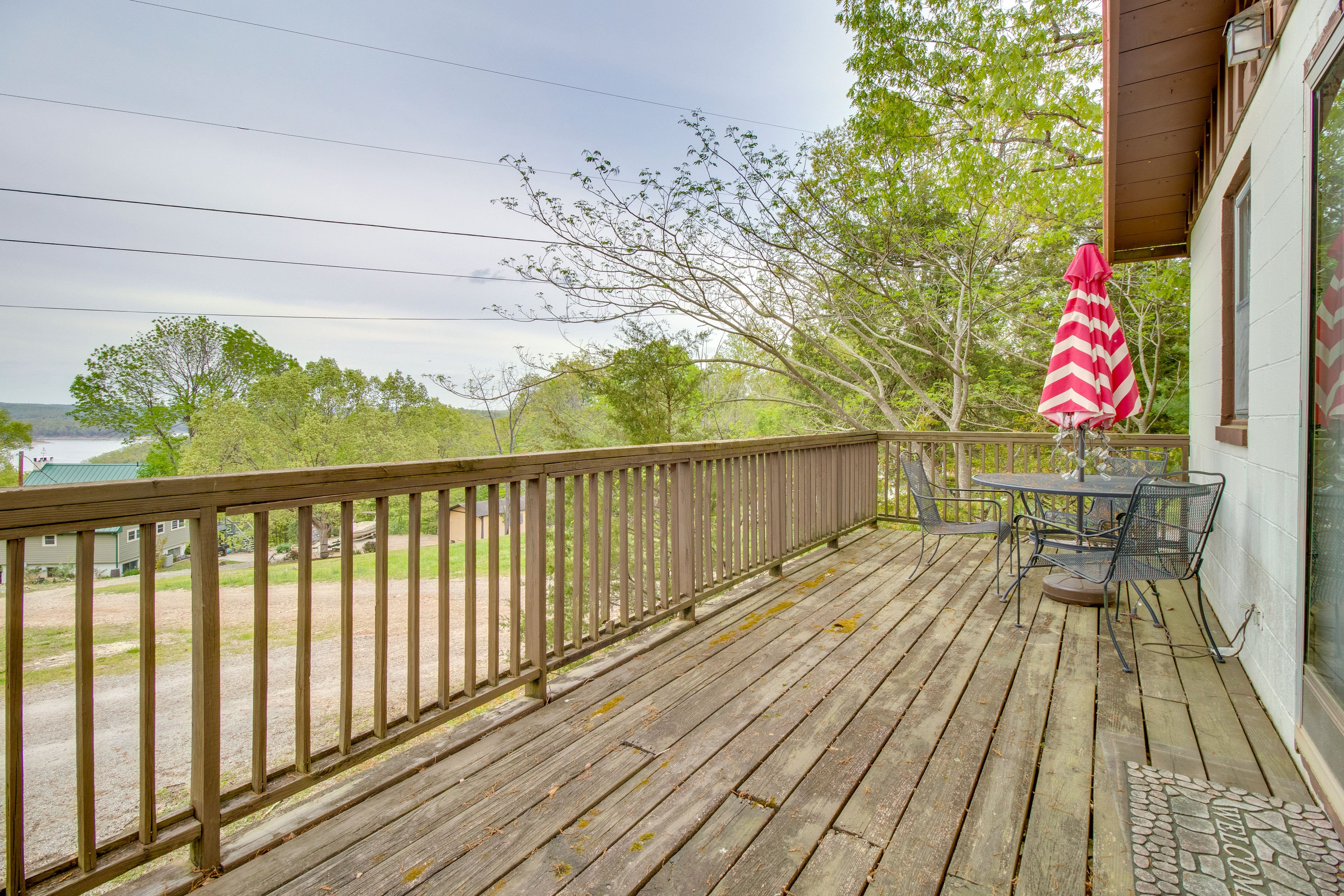 Cottage Exterior | Furnished Deck | Lake Views