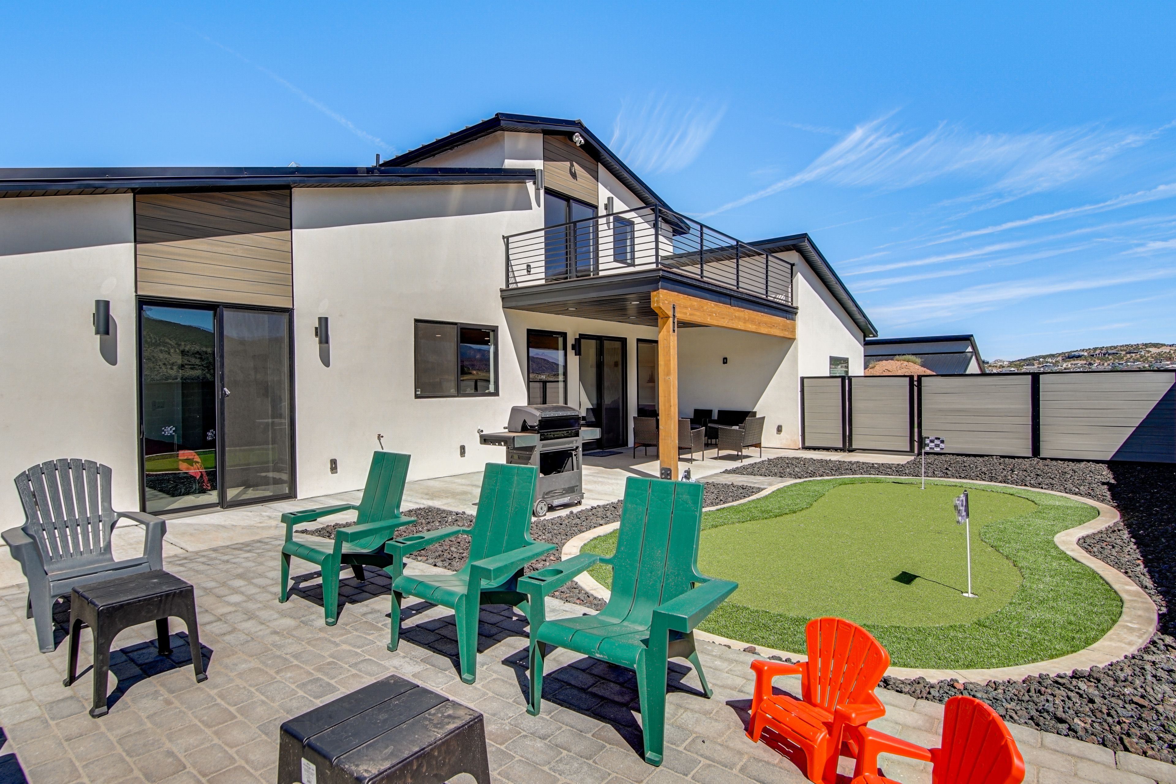 Fenced Yard | Putting Green | Gas Grill | Balcony w/ Mountain Views