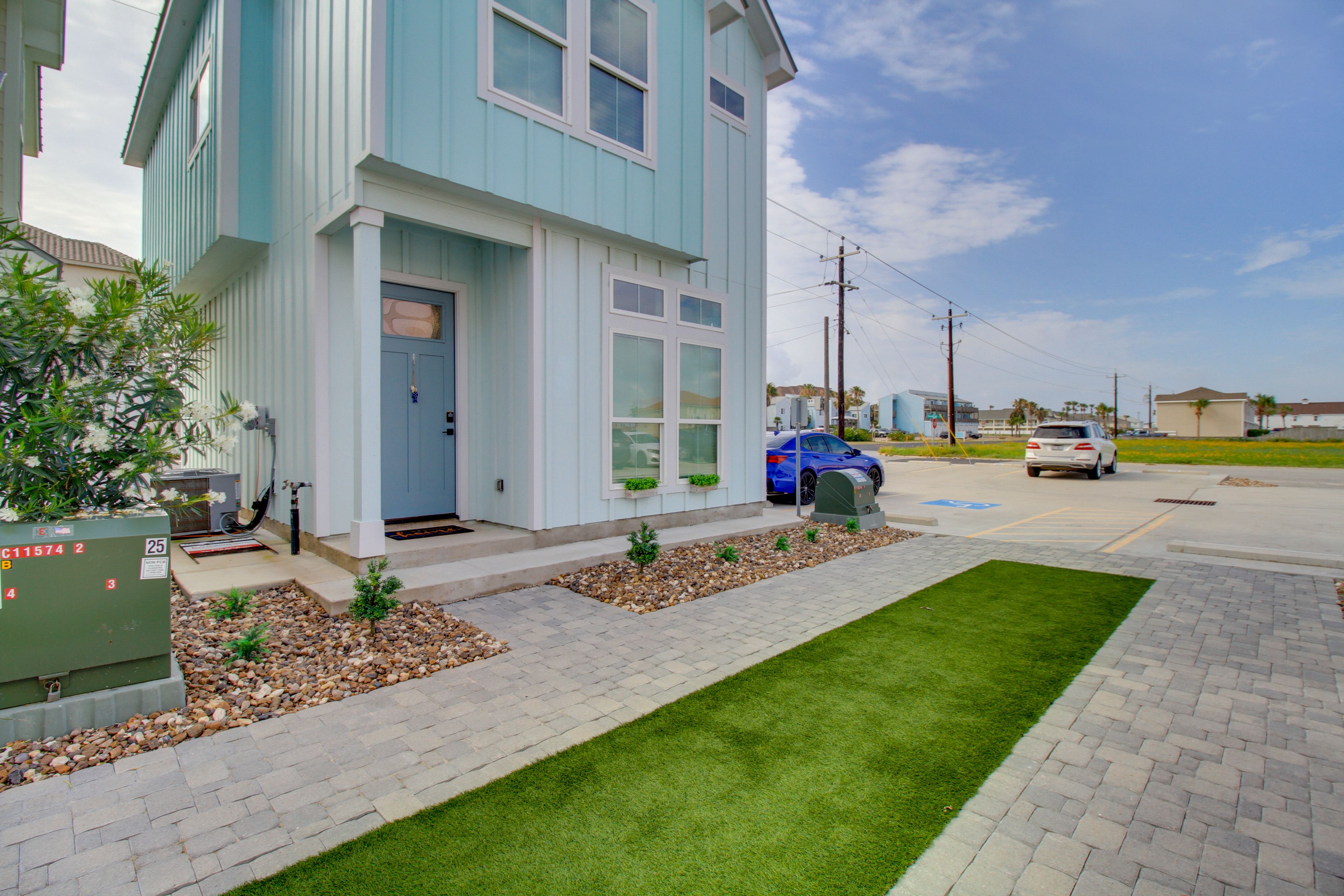 Property Exterior | Dedicated Parking Spot (1 Vehicle)