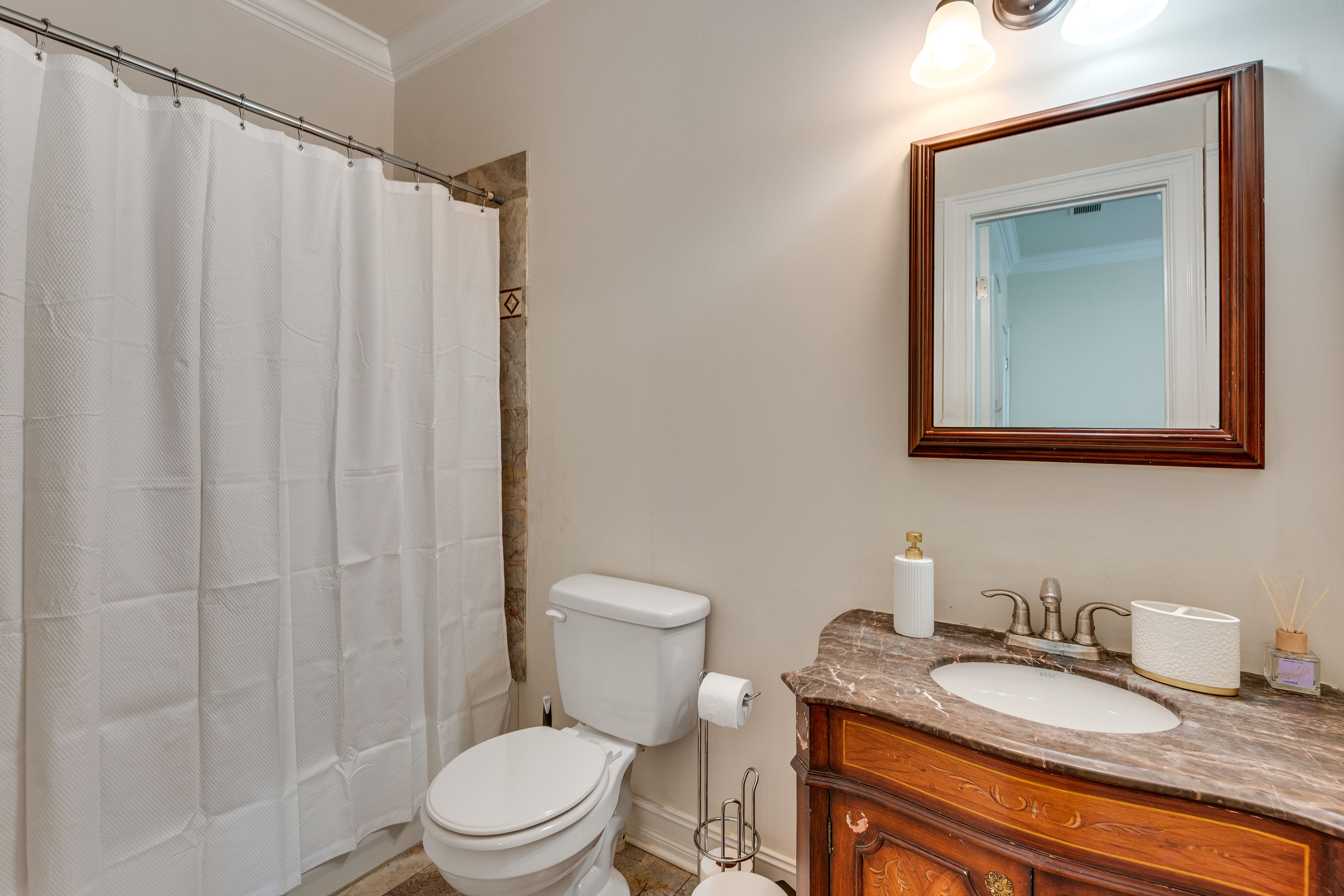 En-Suite Bathroom | Towels & Linens Provided