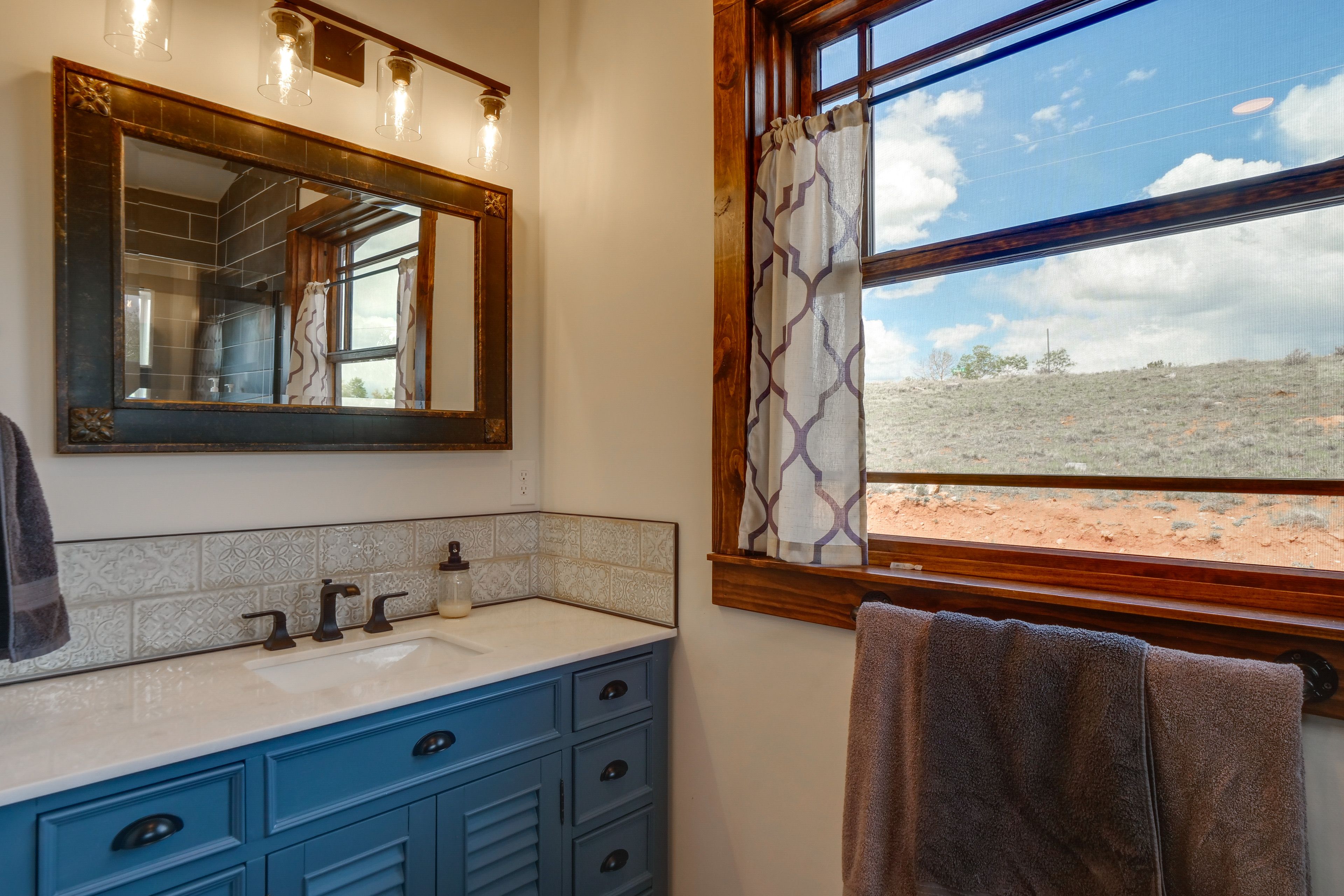 En-Suite Bathroom | Shower | Washer/Dryer | Main Level