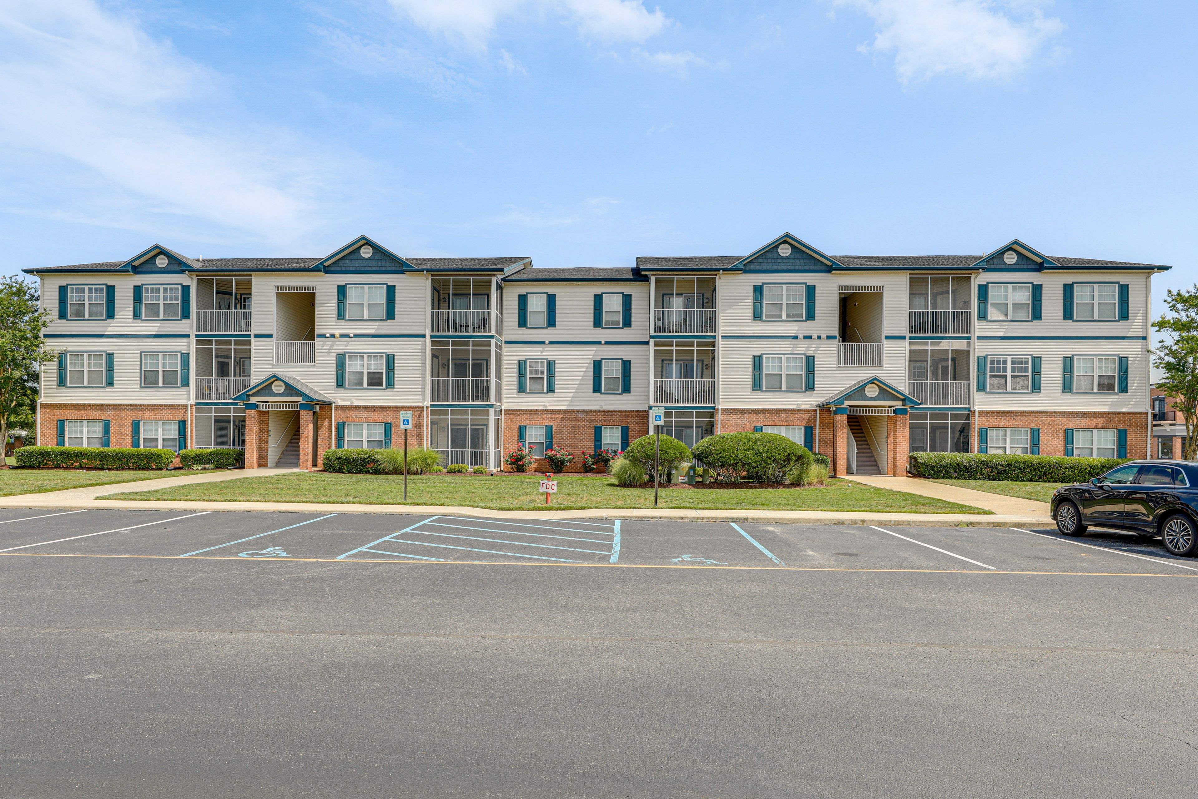 Condo Exterior | Open Parking Lot (2 Vehicles)