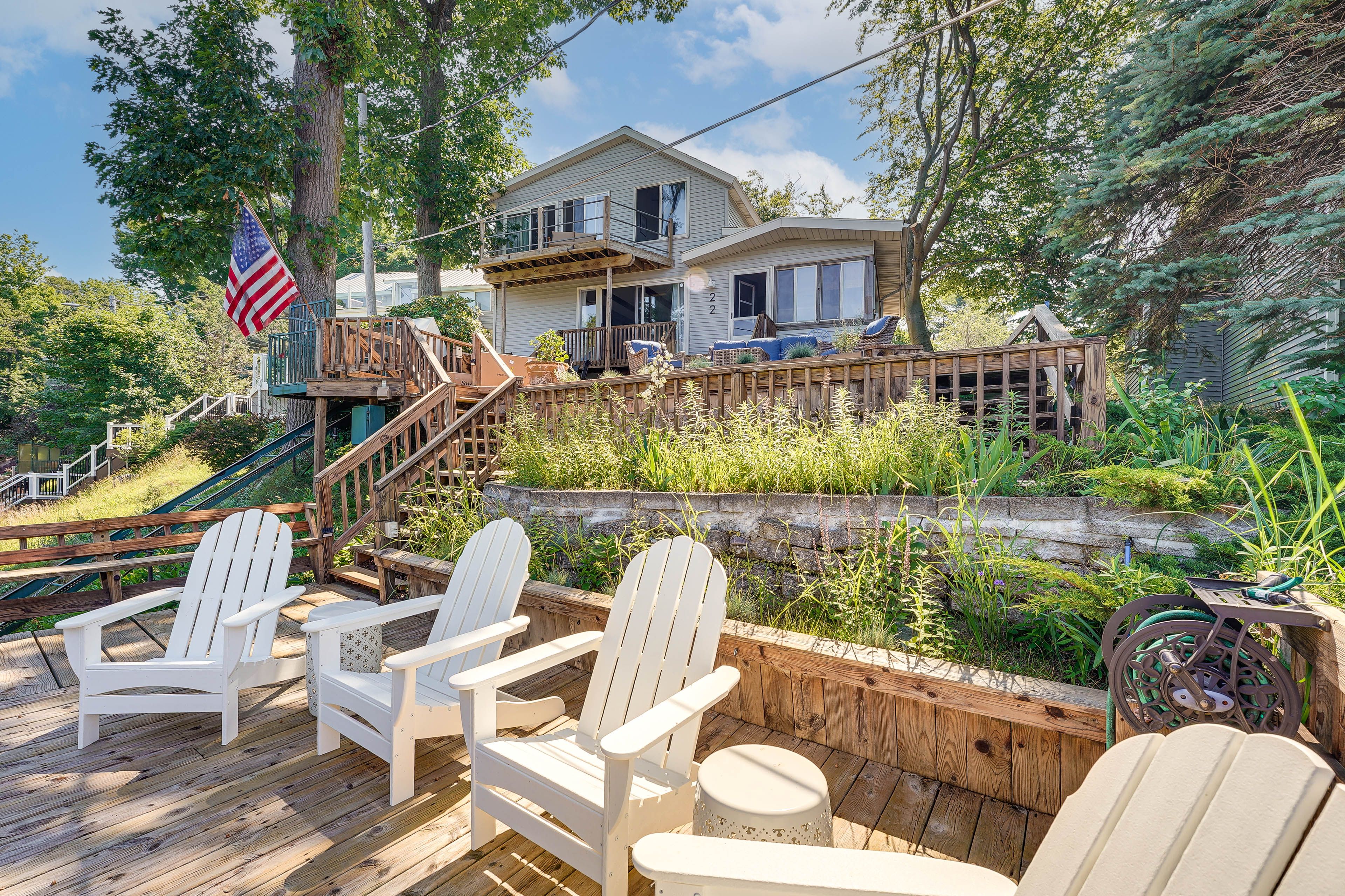 Shared Deck | Home Exterior | Single-Story Unit on Lower Level