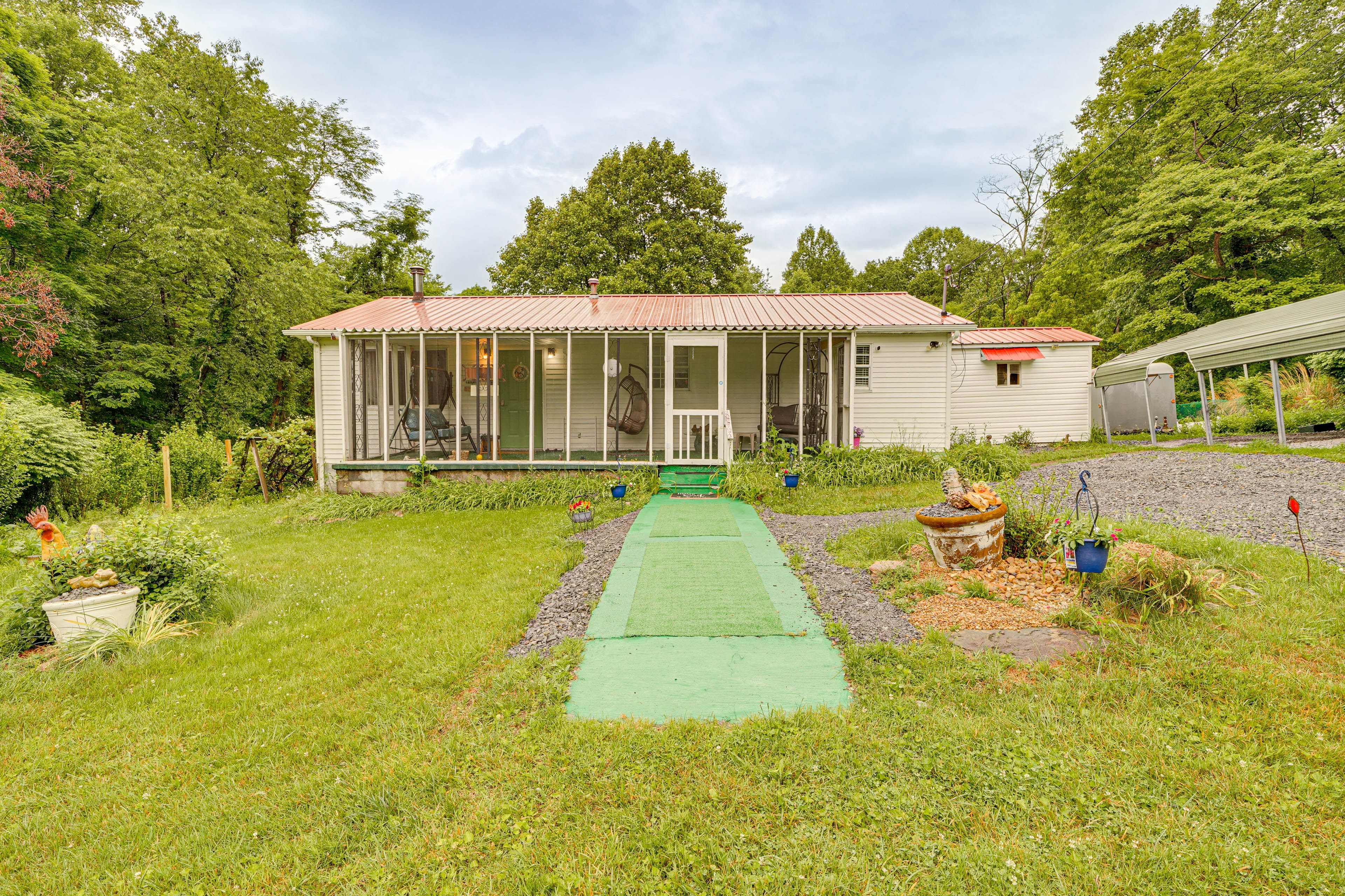 Front Exterior | Single-Story Home | Enclosed Porchh