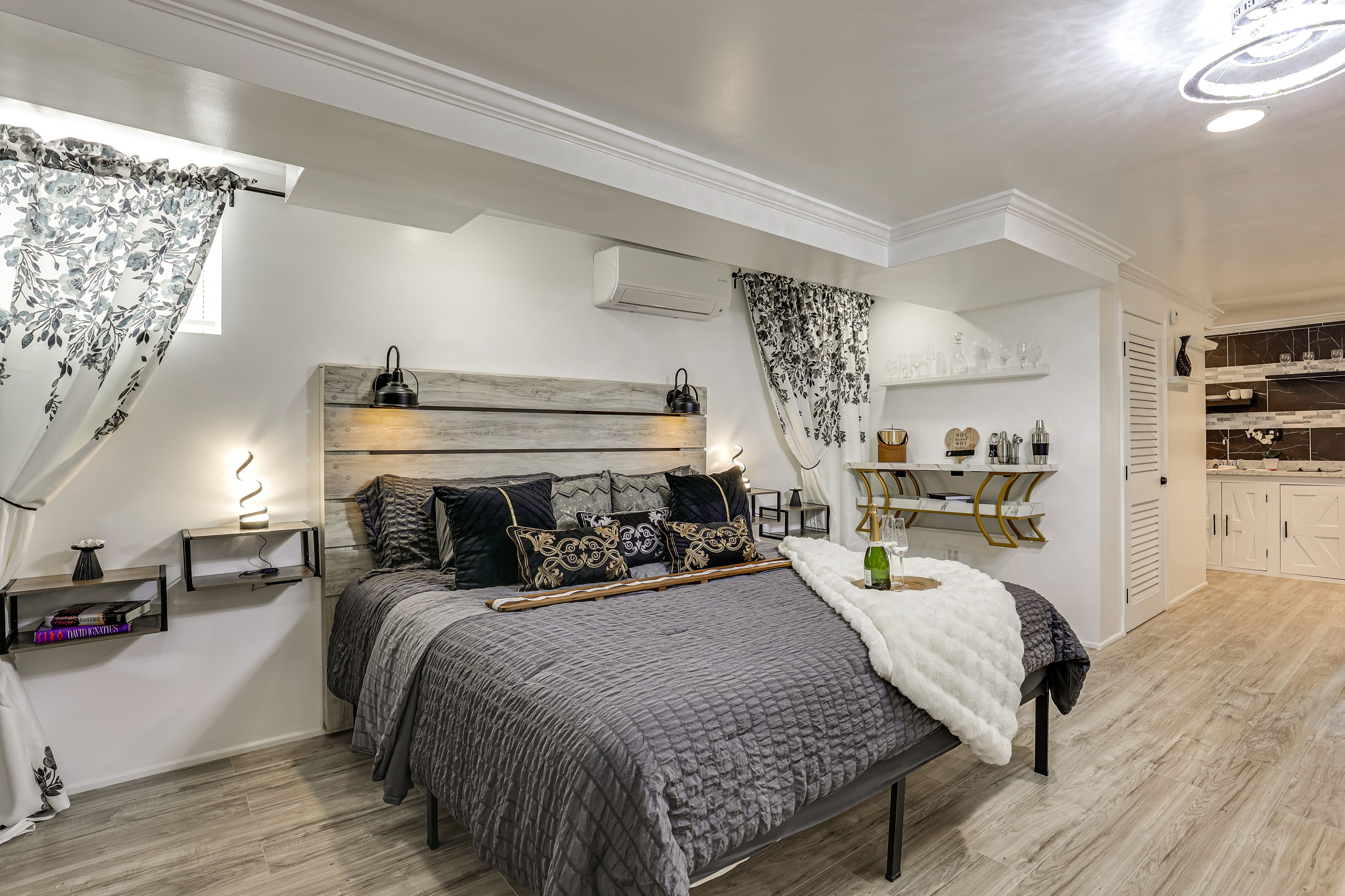 Bedroom 4 (Basement Studio) | King Bed | Electric Fireplace