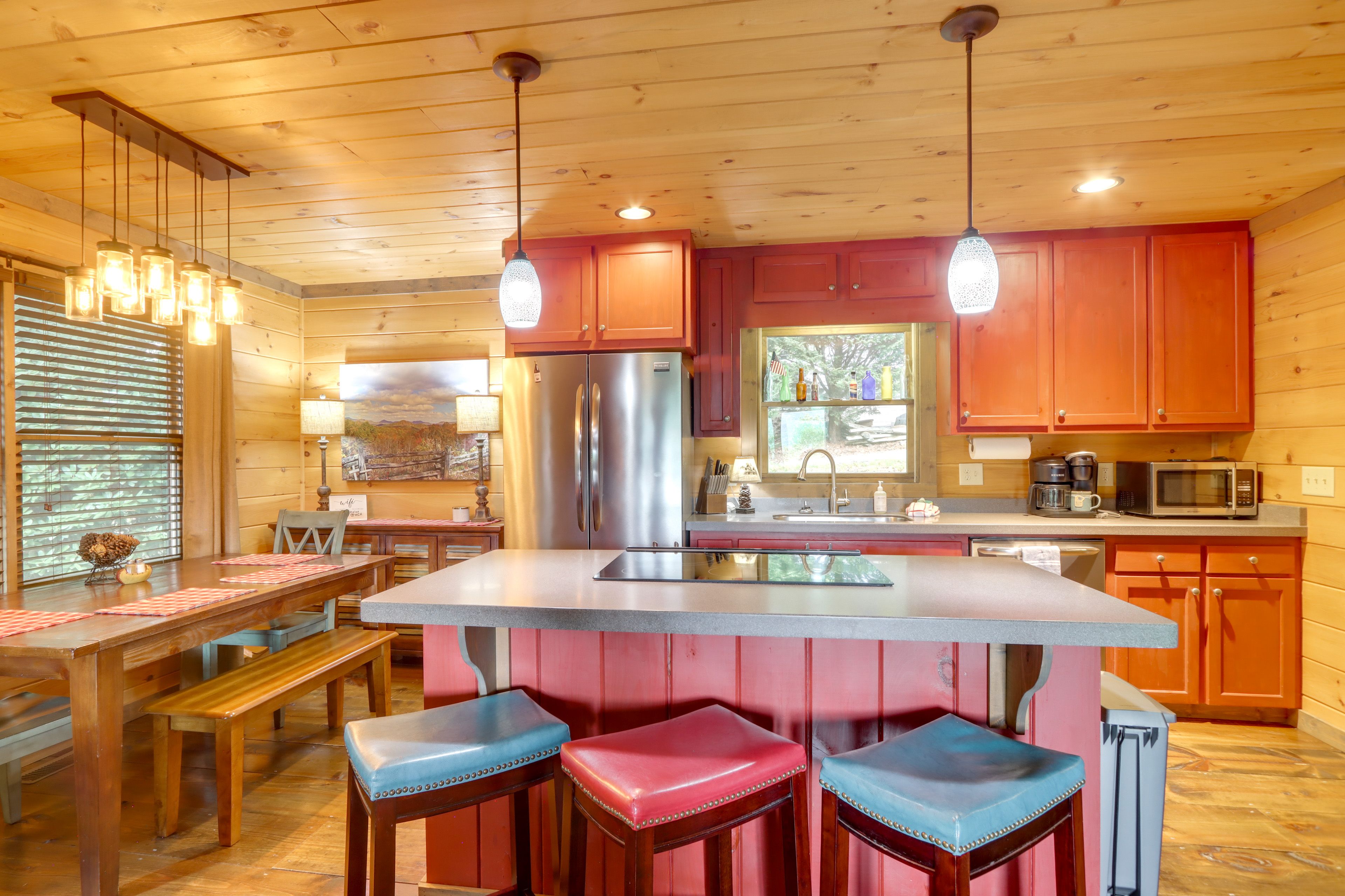 Kitchen & Dining Area | 2-Story Cabin | Open Floor Plan
