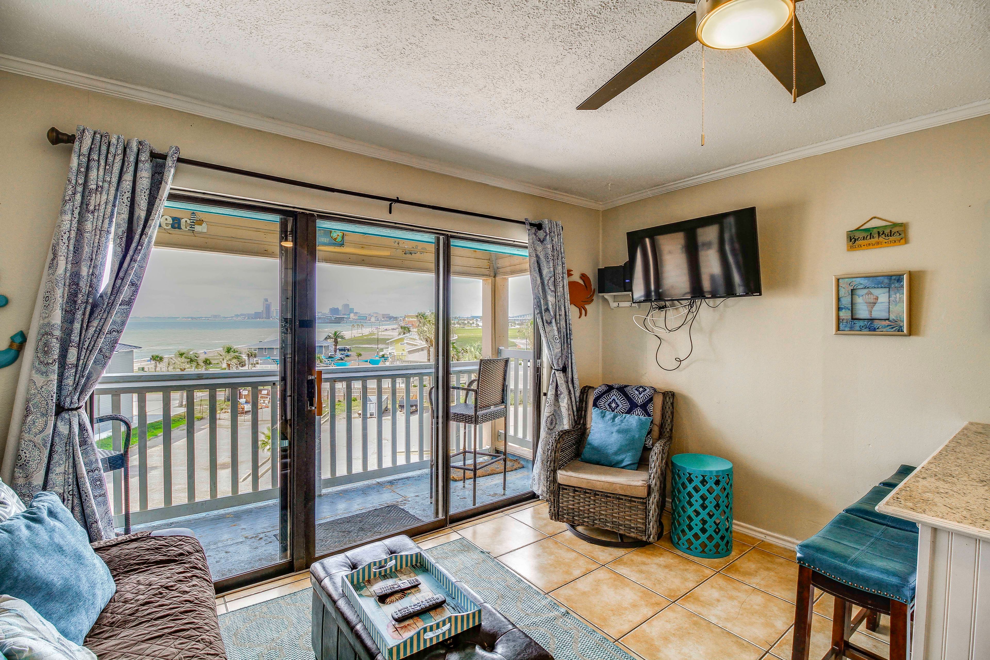 Living Room | Water & USS Lexington Views | Single-Story Unit