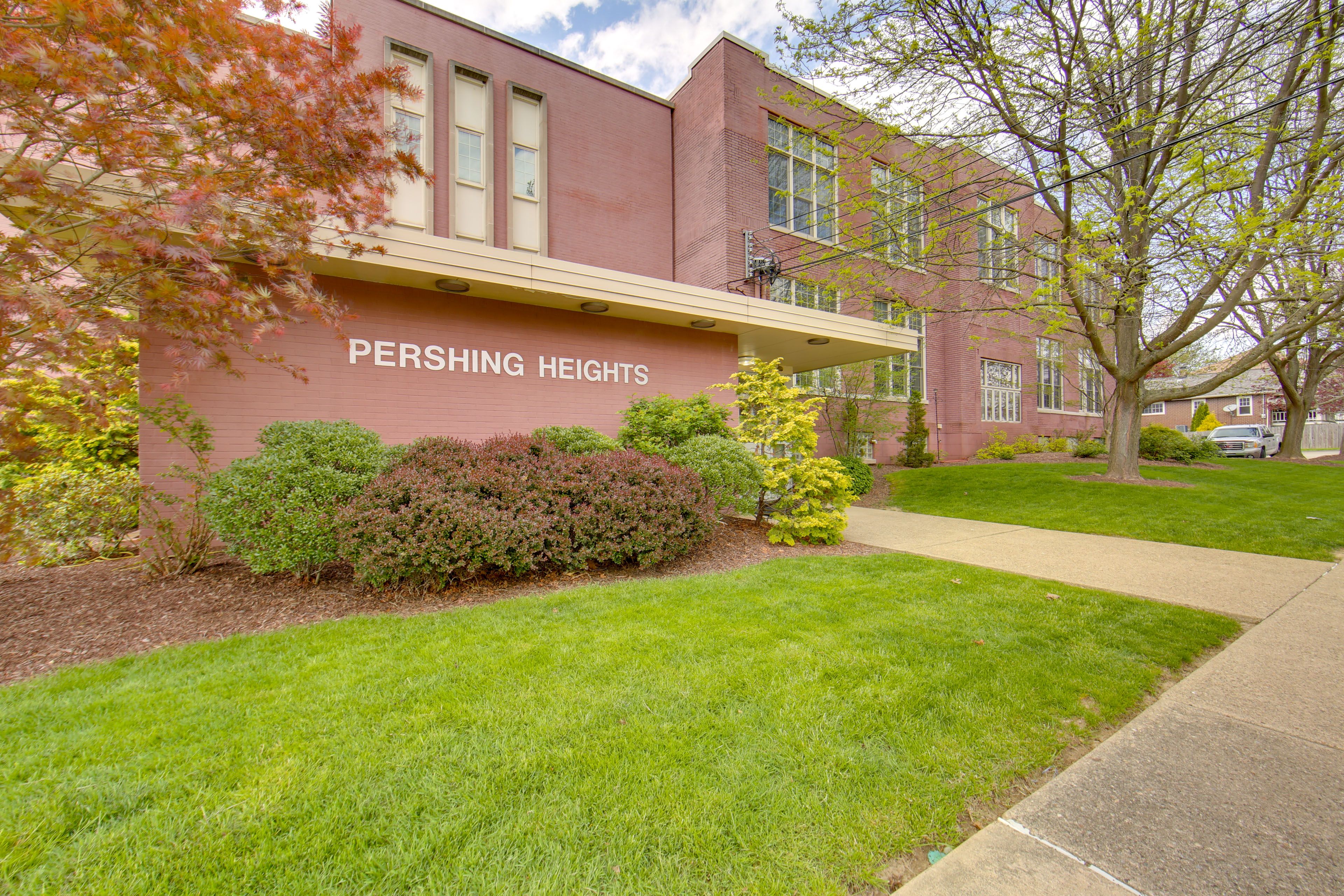 Exterior | Community Lot (Open Parking)
