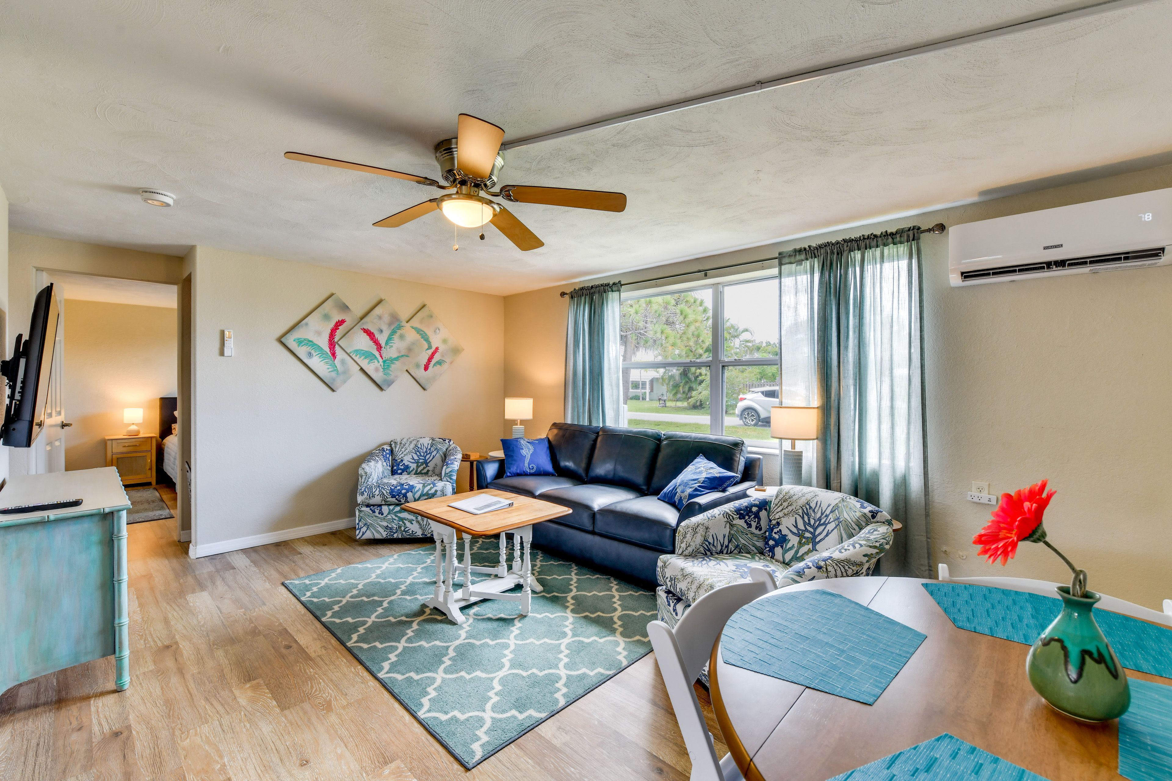 Sitting Room | Queen Sleeper Sofa | Dining Table | Smart TV