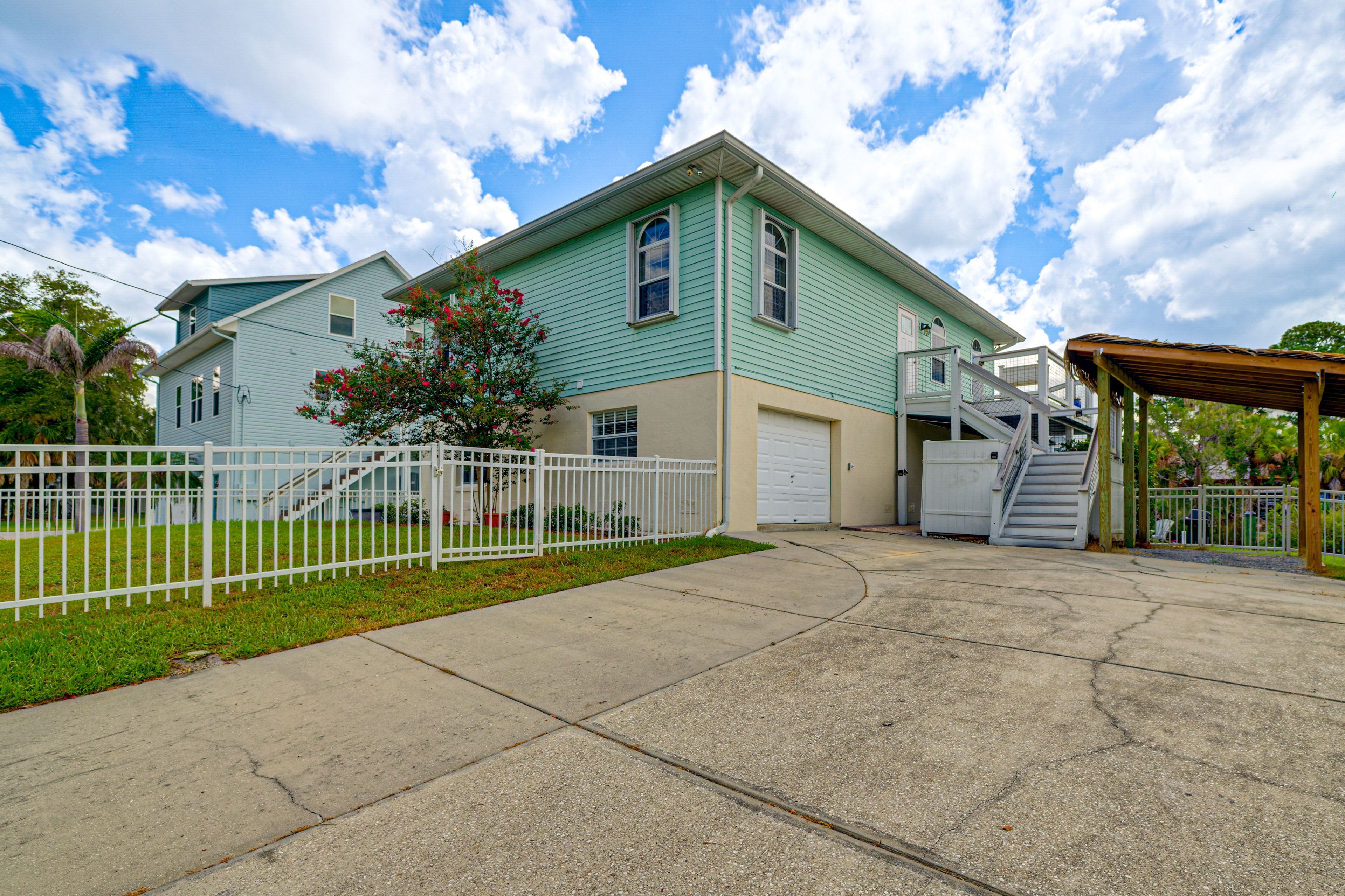 Parking | Driveway (4 Vehicles) | Golf Cart Space Available