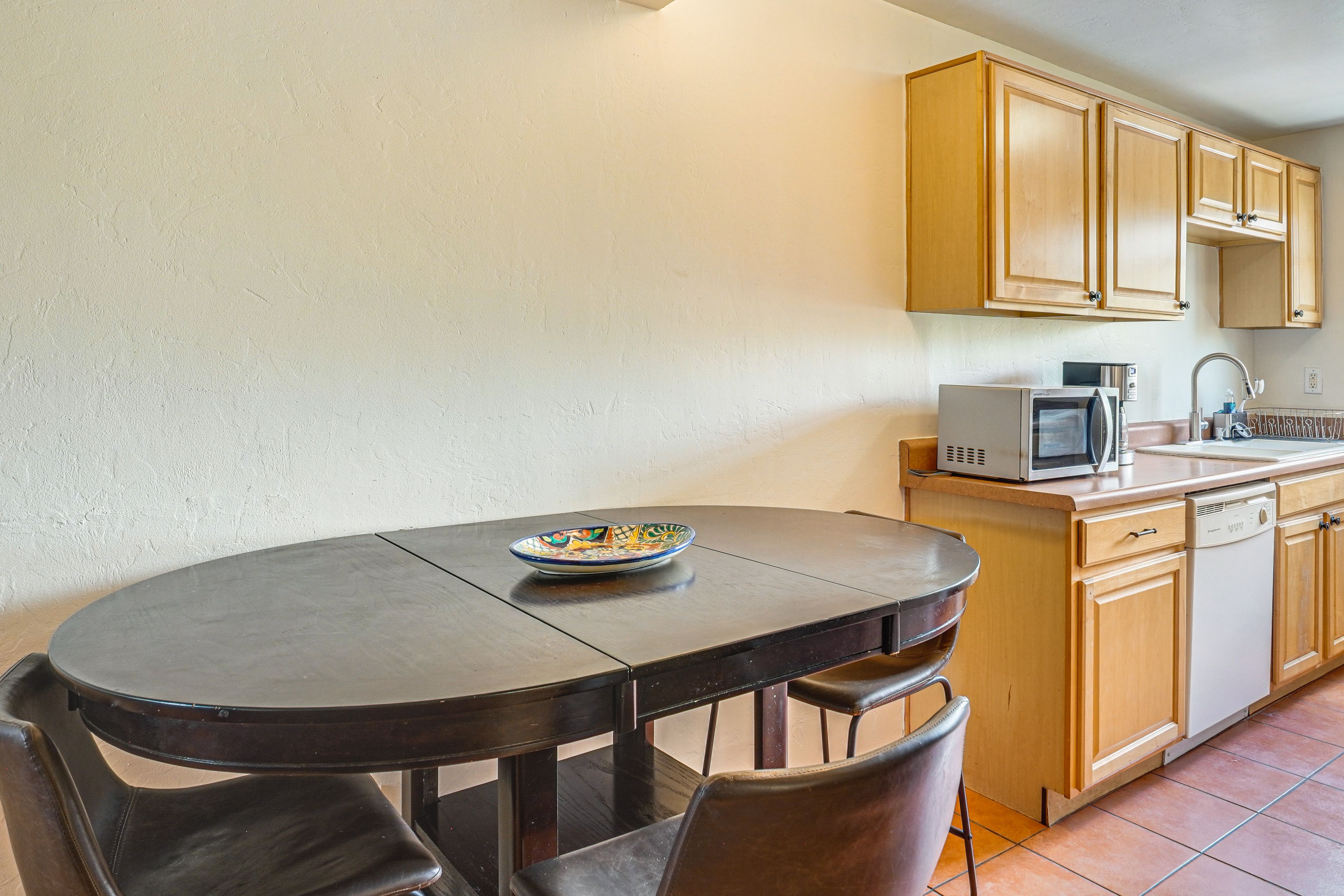 Dining Area & Kitchen | Single-Story Condo on 2nd Floor