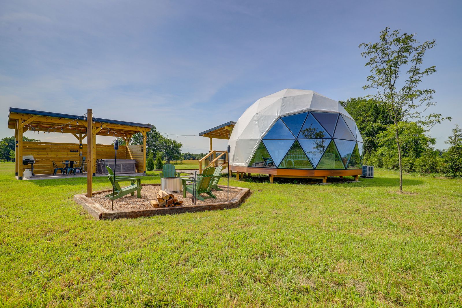 Wander Inn geodesic glamping dome exterior at dusk