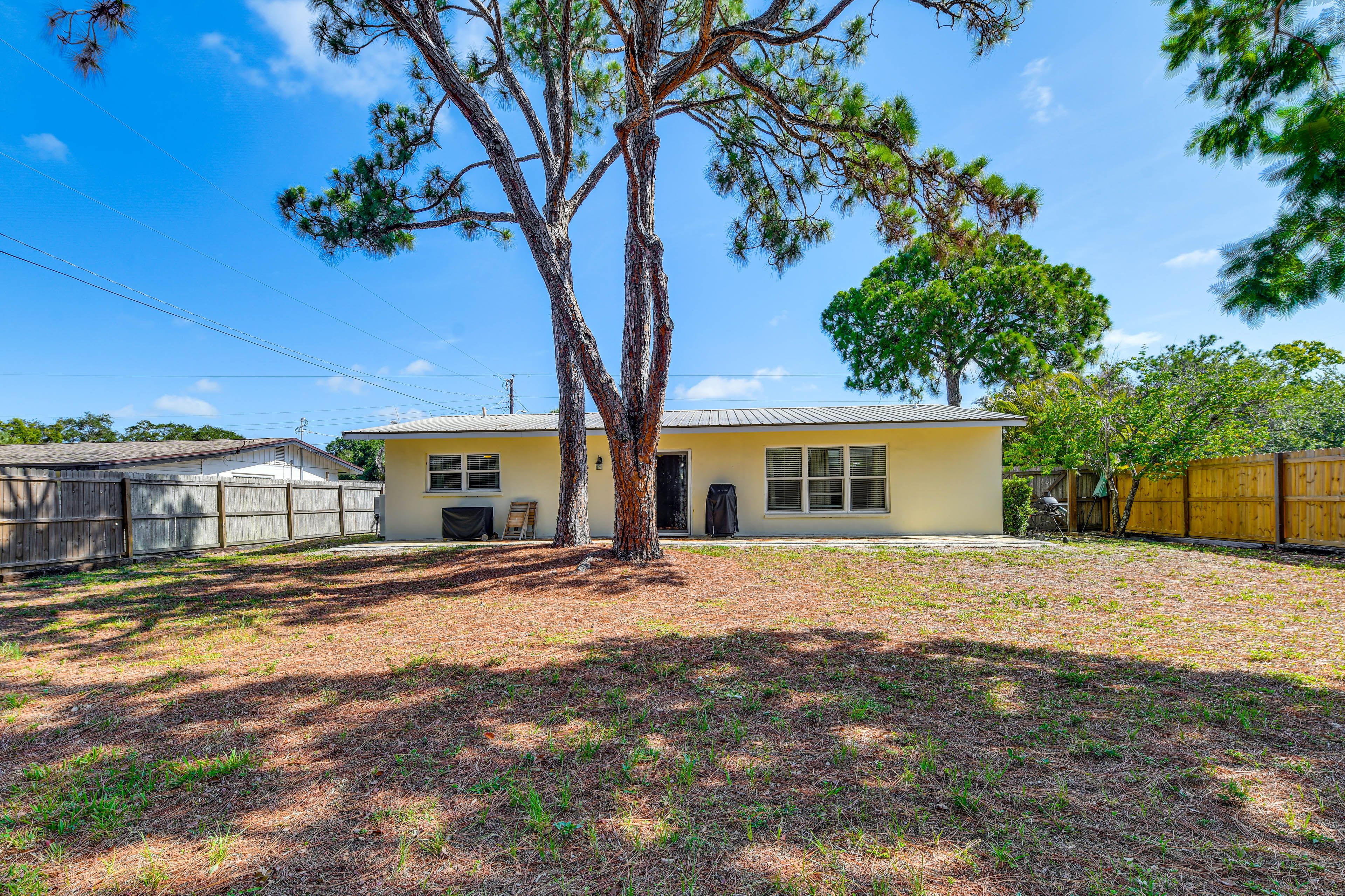 Back Exterior | Spacious Yard | Patio