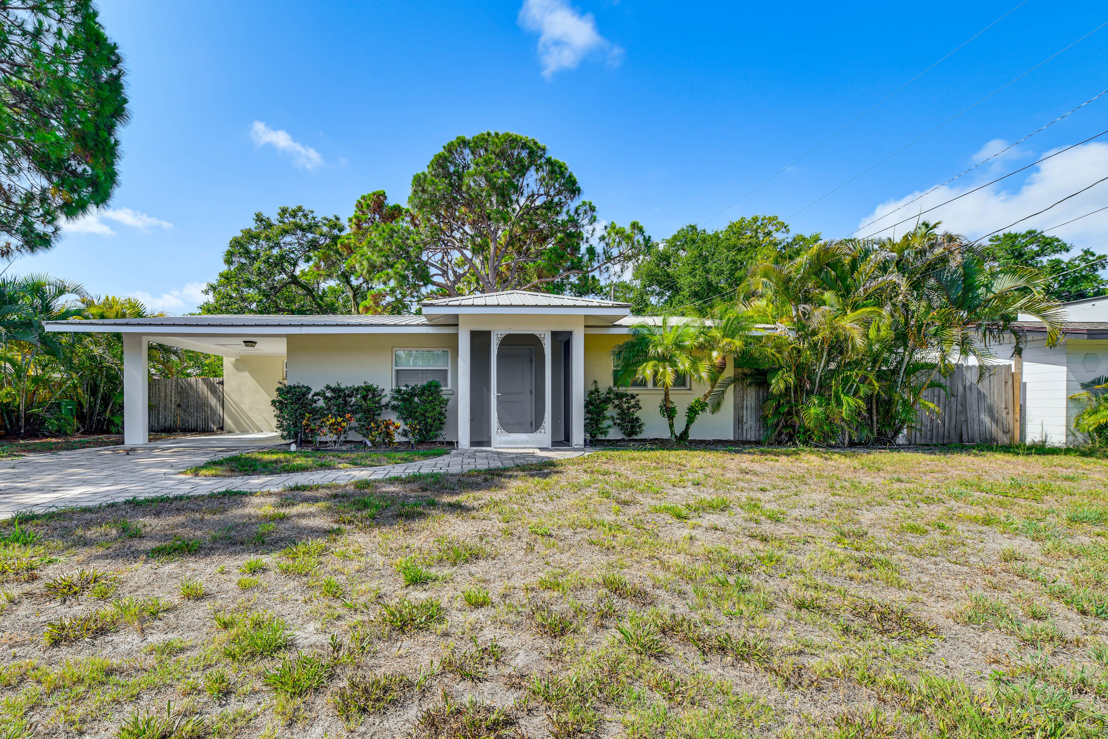 Front Exterior | Parking | Carport (1 Vehicle) | Driveway (3 Vehicles)