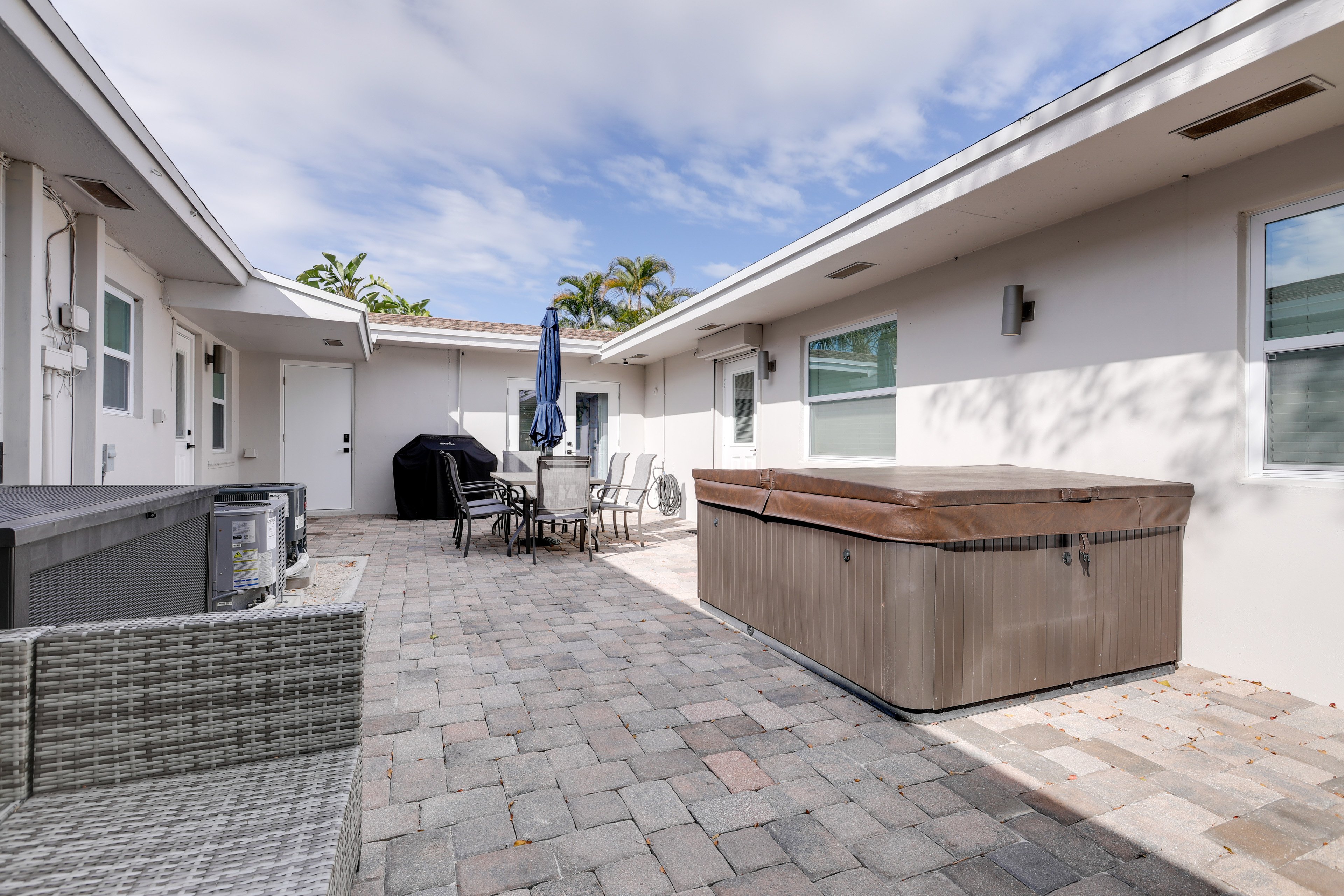 Courtyard | Hot Tub | Gas Grill