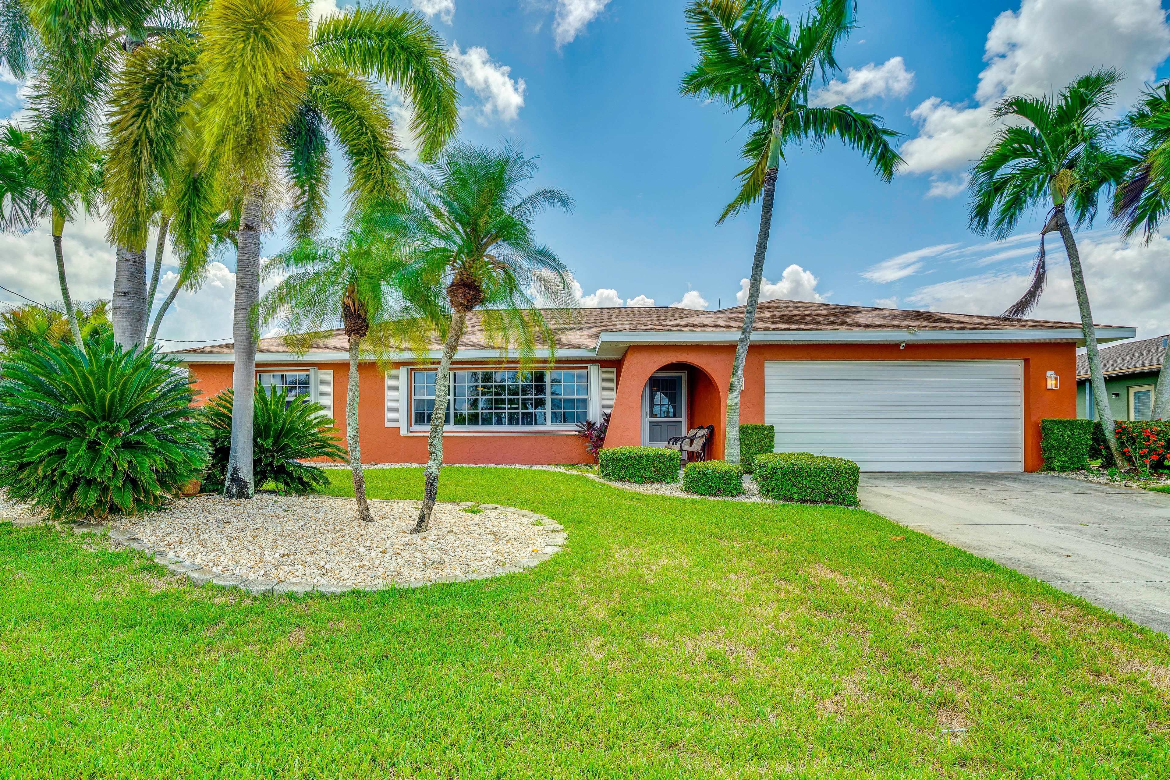 Property Exterior | Screened-In Lanai | Private Pool