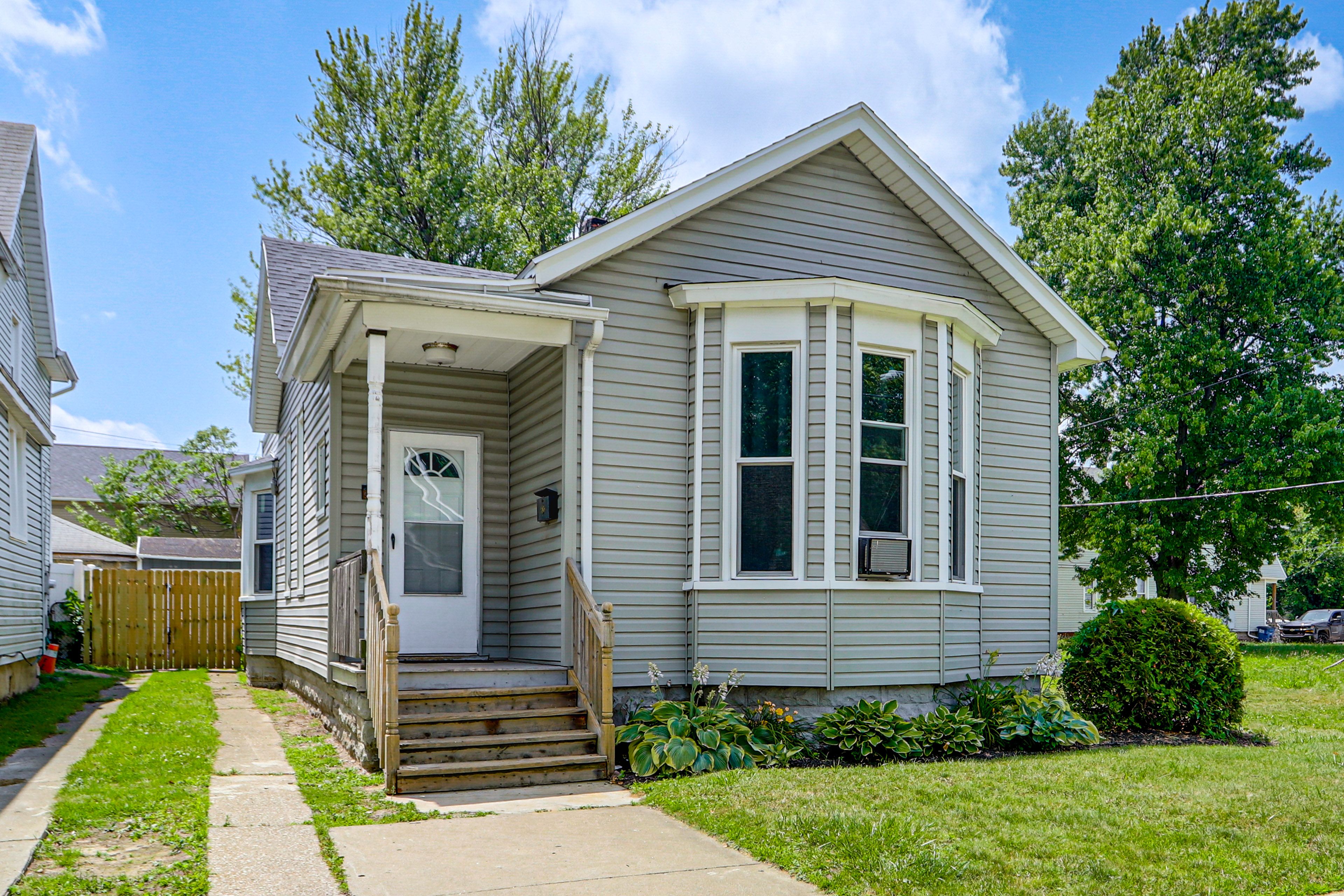 Exterior | Driveway (3 Vehicles) | Free Street Parking