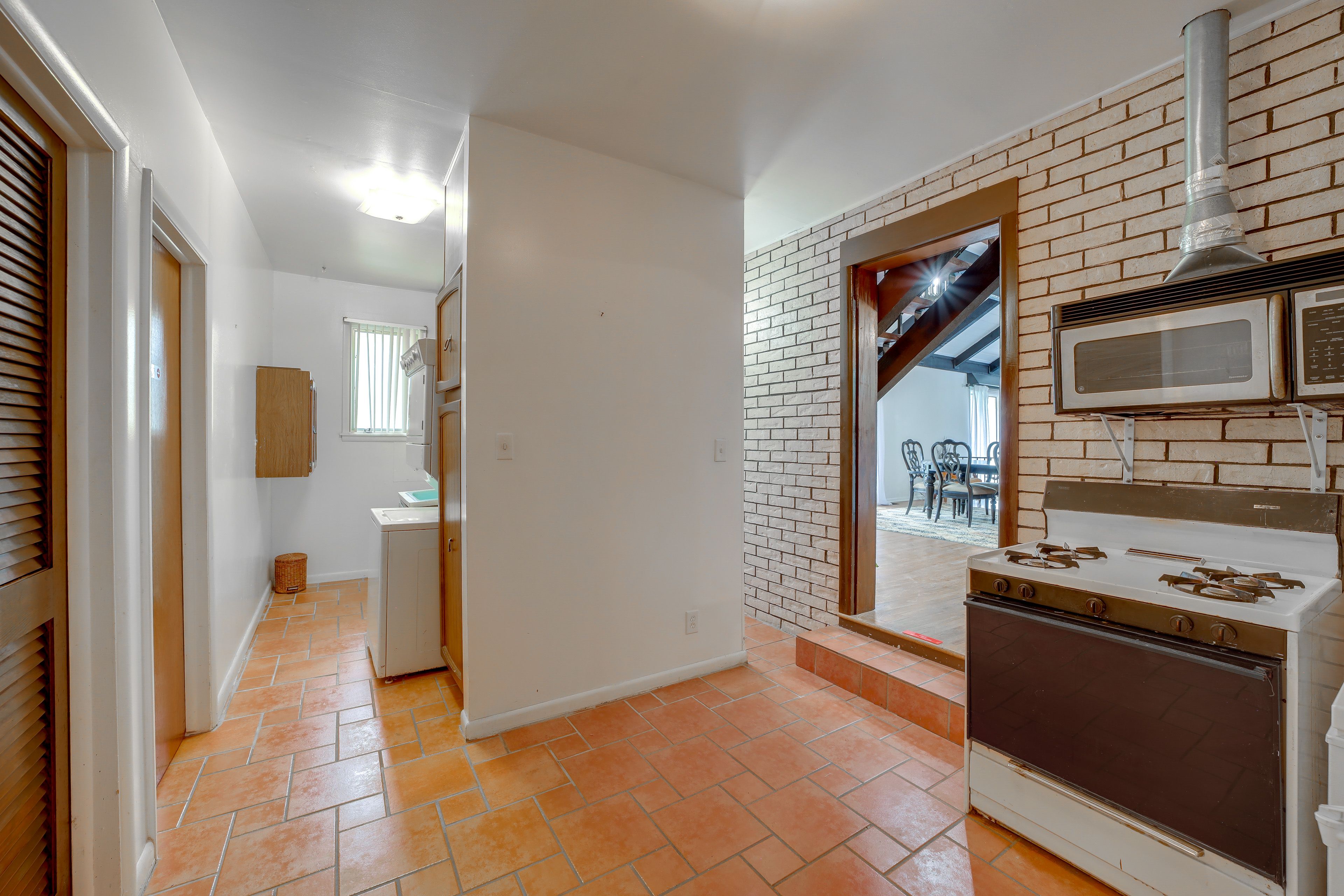 Laundry Room | Addt'l Oven & Microwave | 1st Floor (1 Step Down)