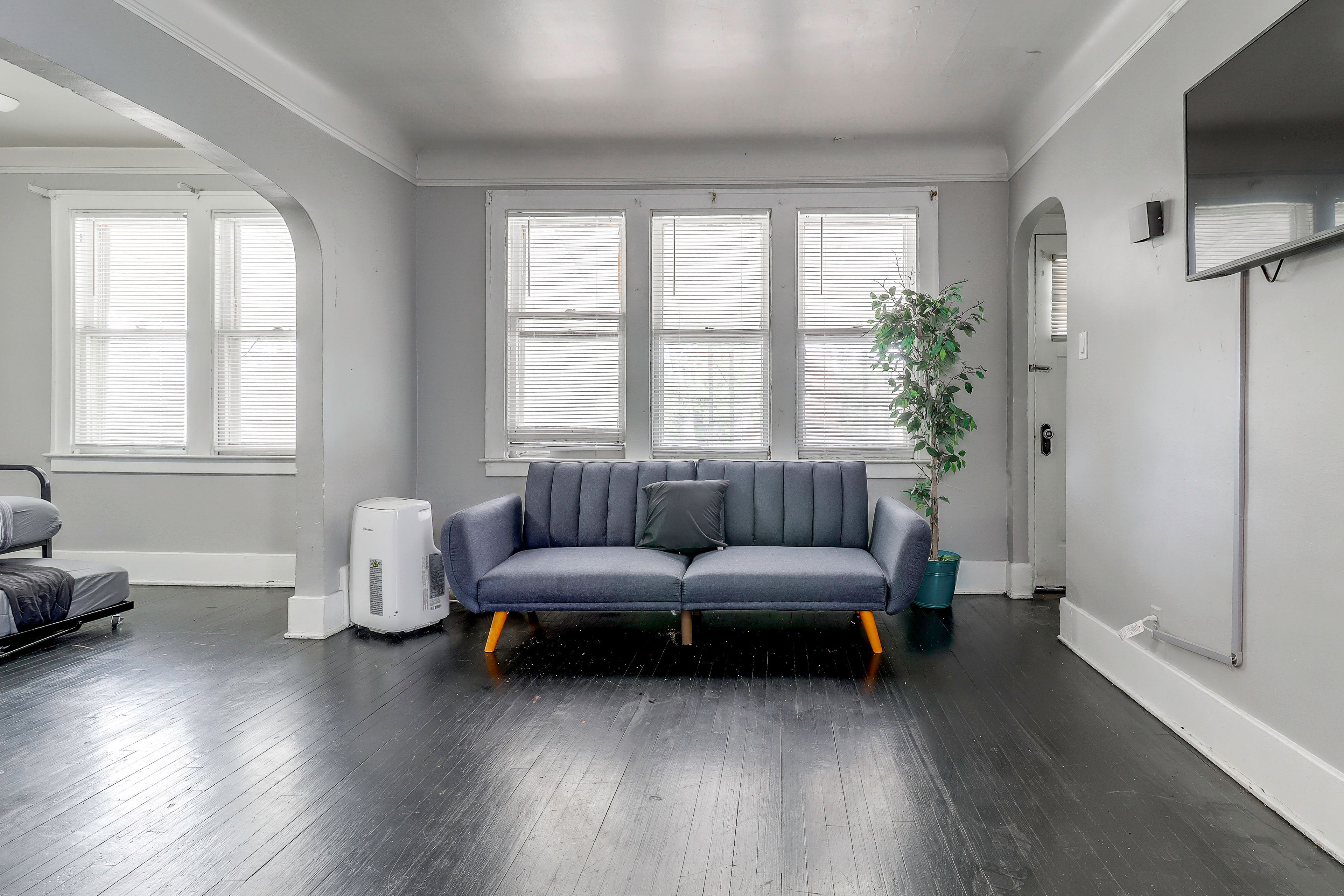 Living Room | Queen Futon | Twin Daybed w/ Twin Trundle | Smart TV