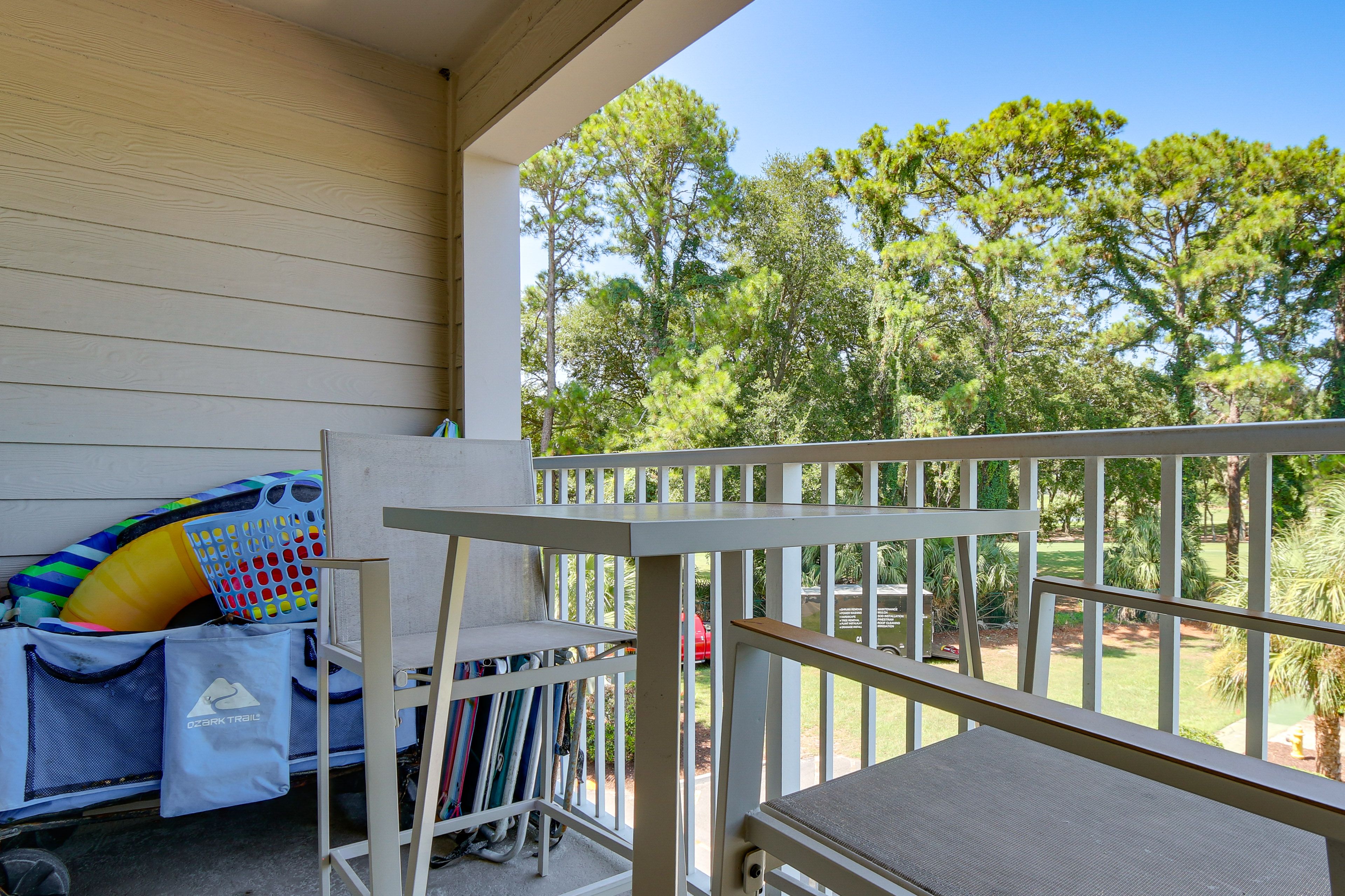 Covered Balcony | Outdoor Dining | Beach Gear + Wagon