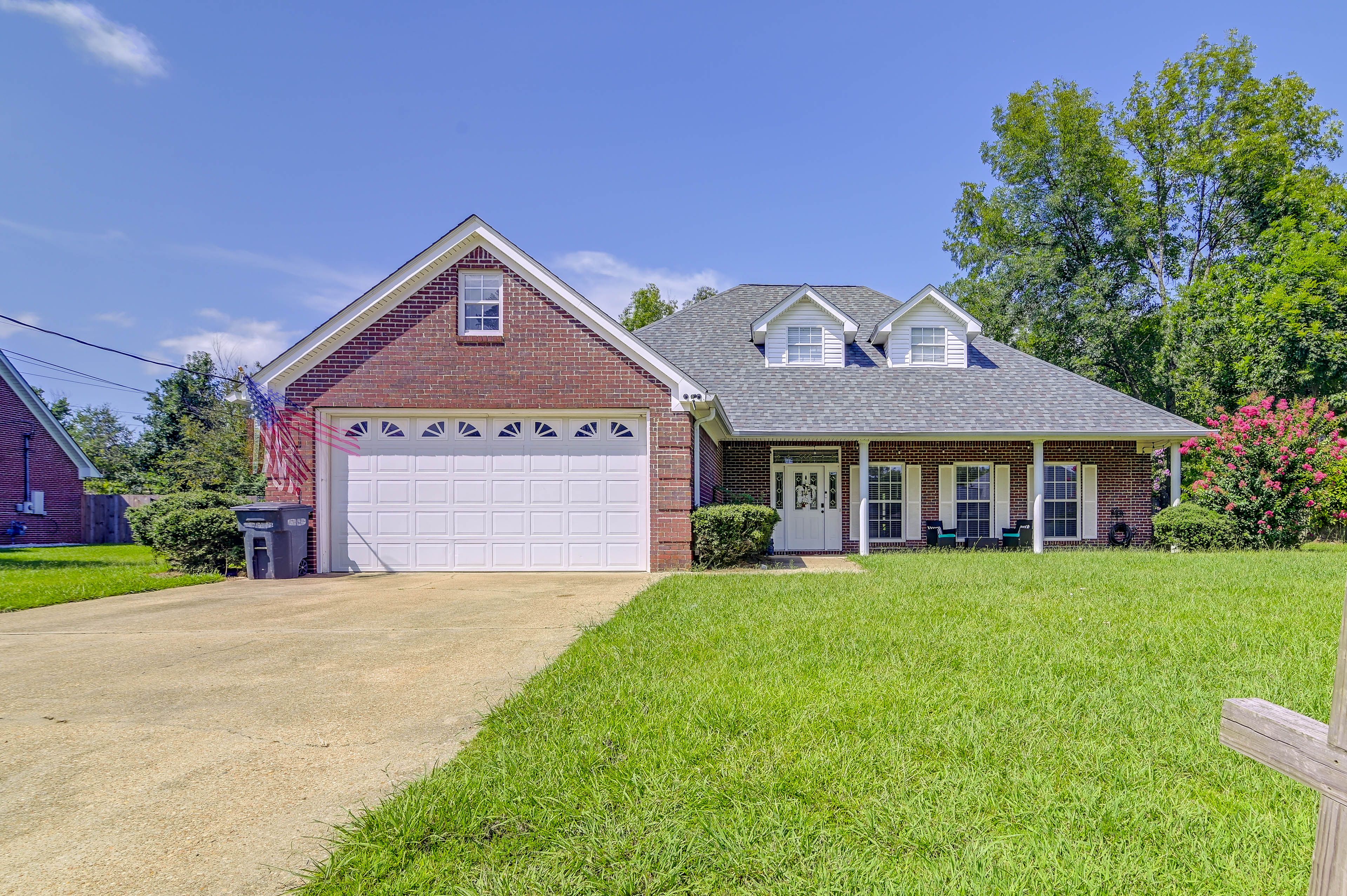 Exterior | Garage (2 Small Vehicles) | Driveway (4 Vehicles)