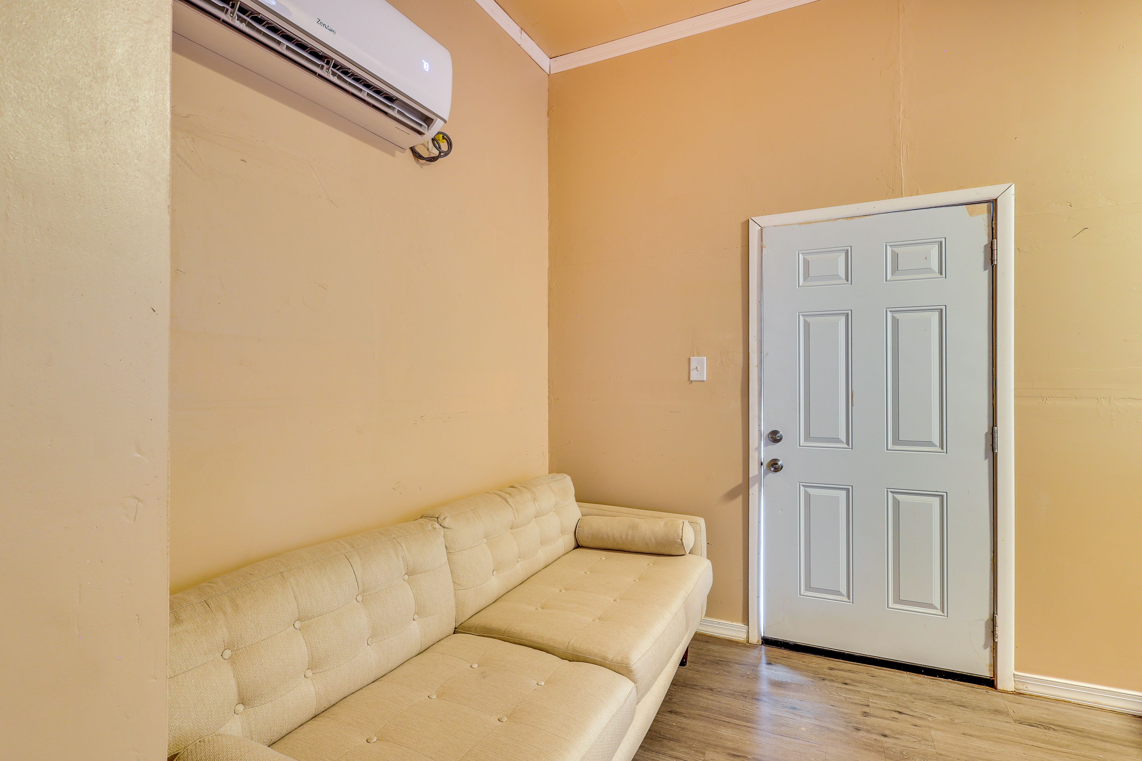 Studio | Living Area | Full Sleeper Sofa | Flat-Screen TV