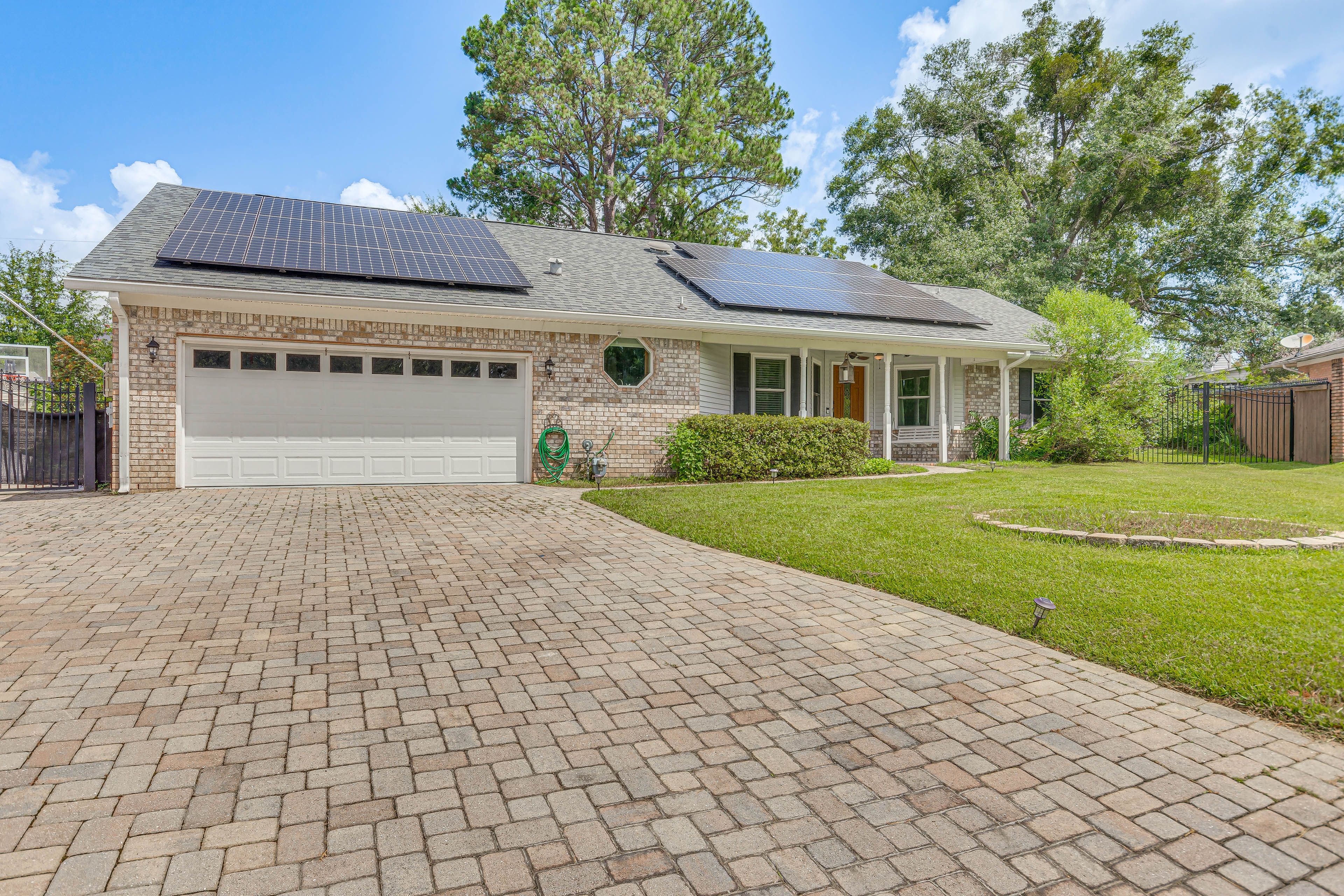Parking | Garage (2 Vehicles) | Driveway (8 Vehicles) | EV Charger
