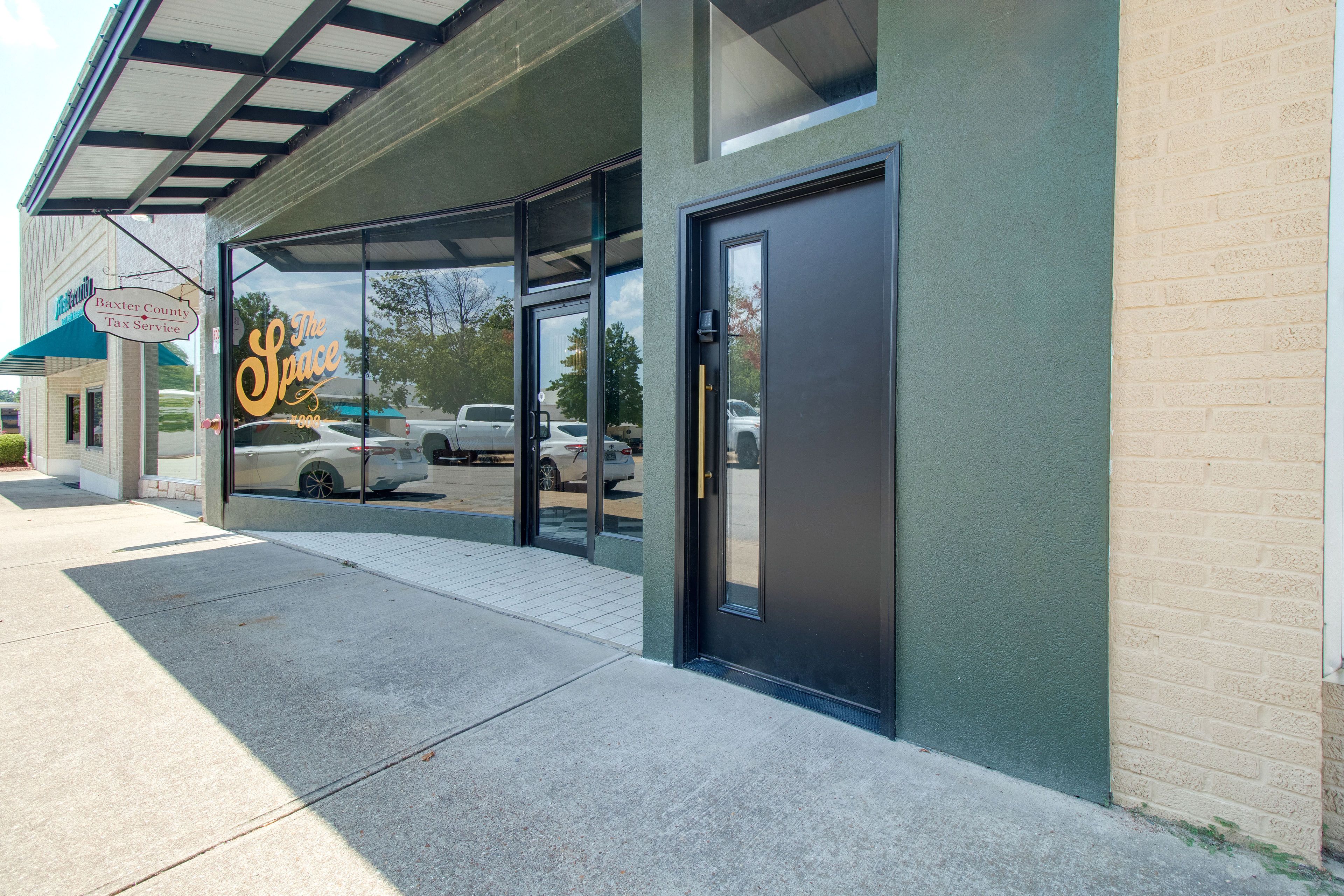 Storefront Exterior | Open Parking in Lot Across the Street