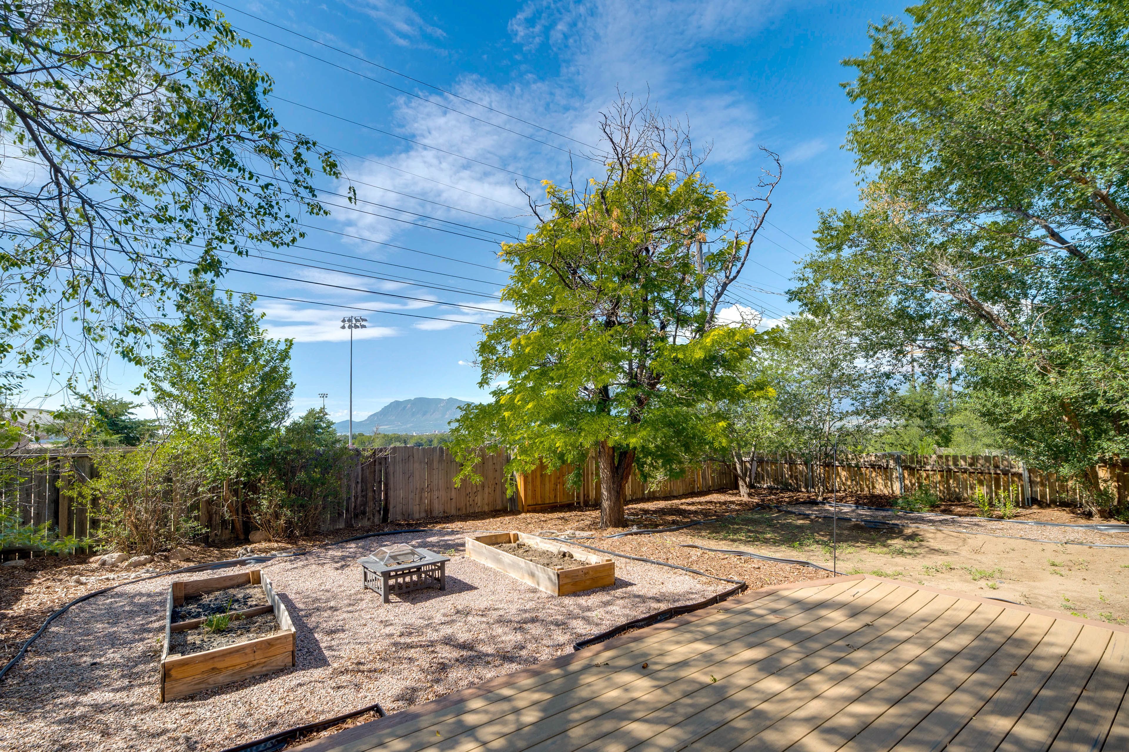 Fenced Yard | Wood-Burning Fire Pit | Mountain Views