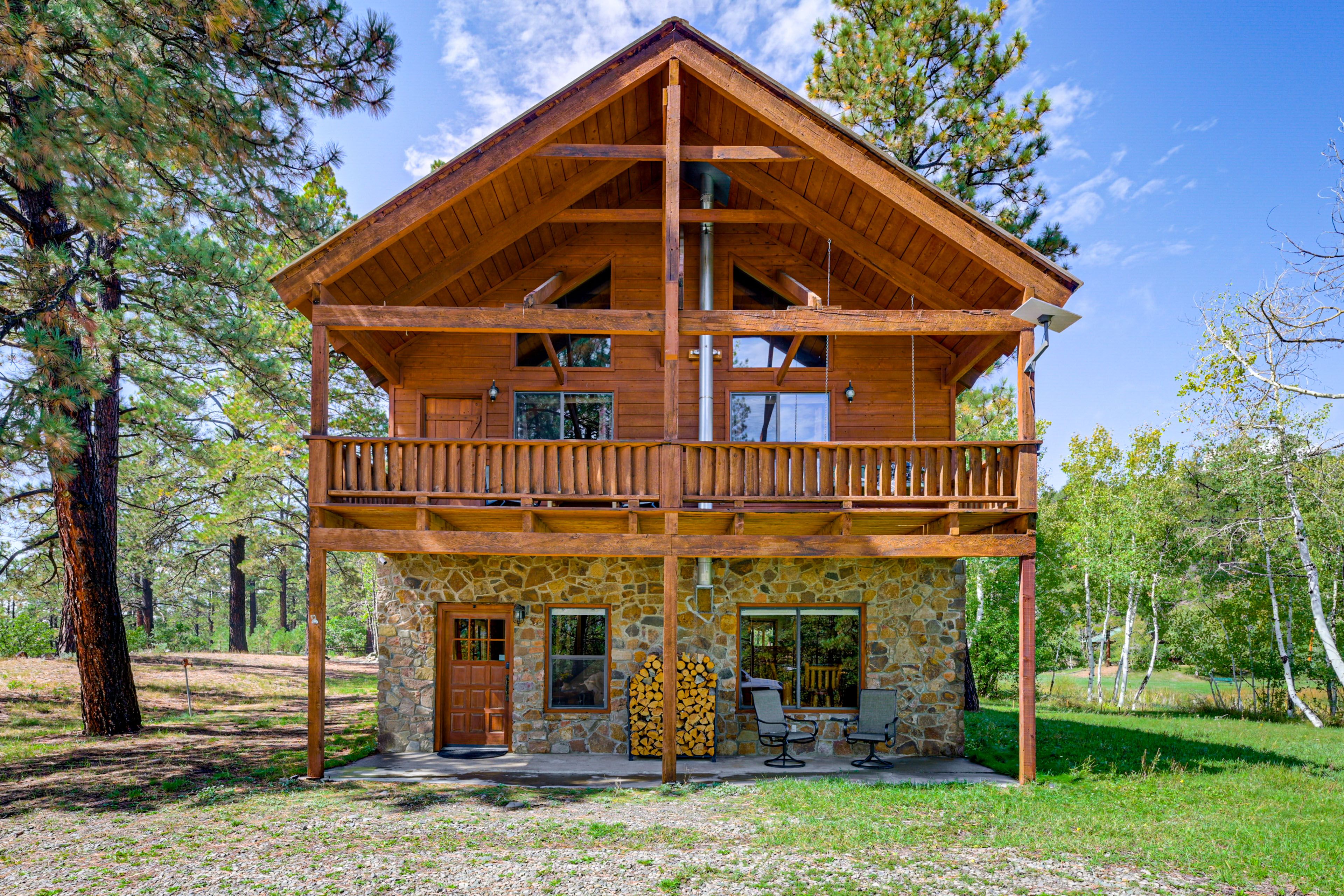 Exterior | 3-Story Cabin | Covered Decks & Patio