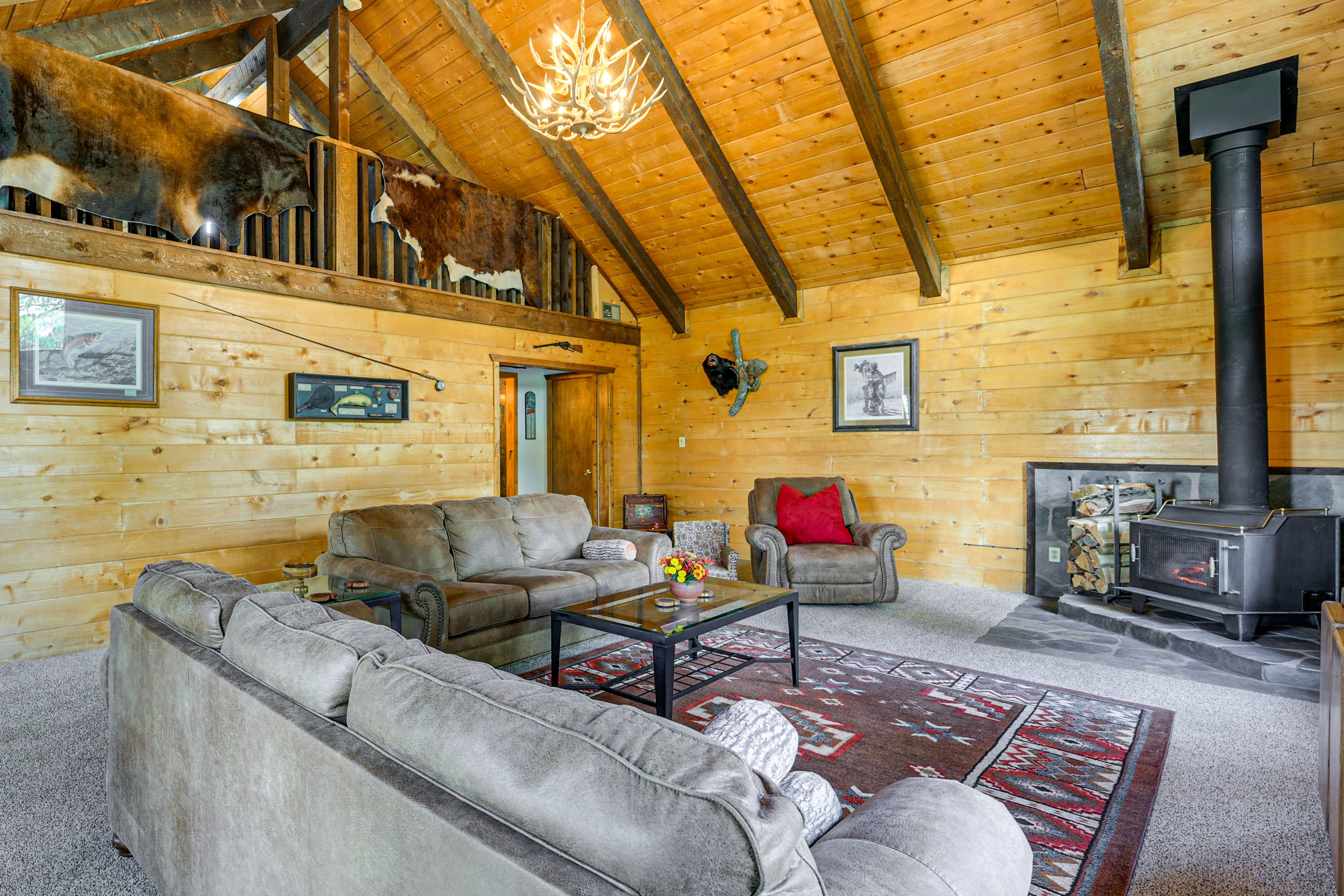 Living Room | 2 Queen Sleeper Sofas | Wood Stove | Main Floor