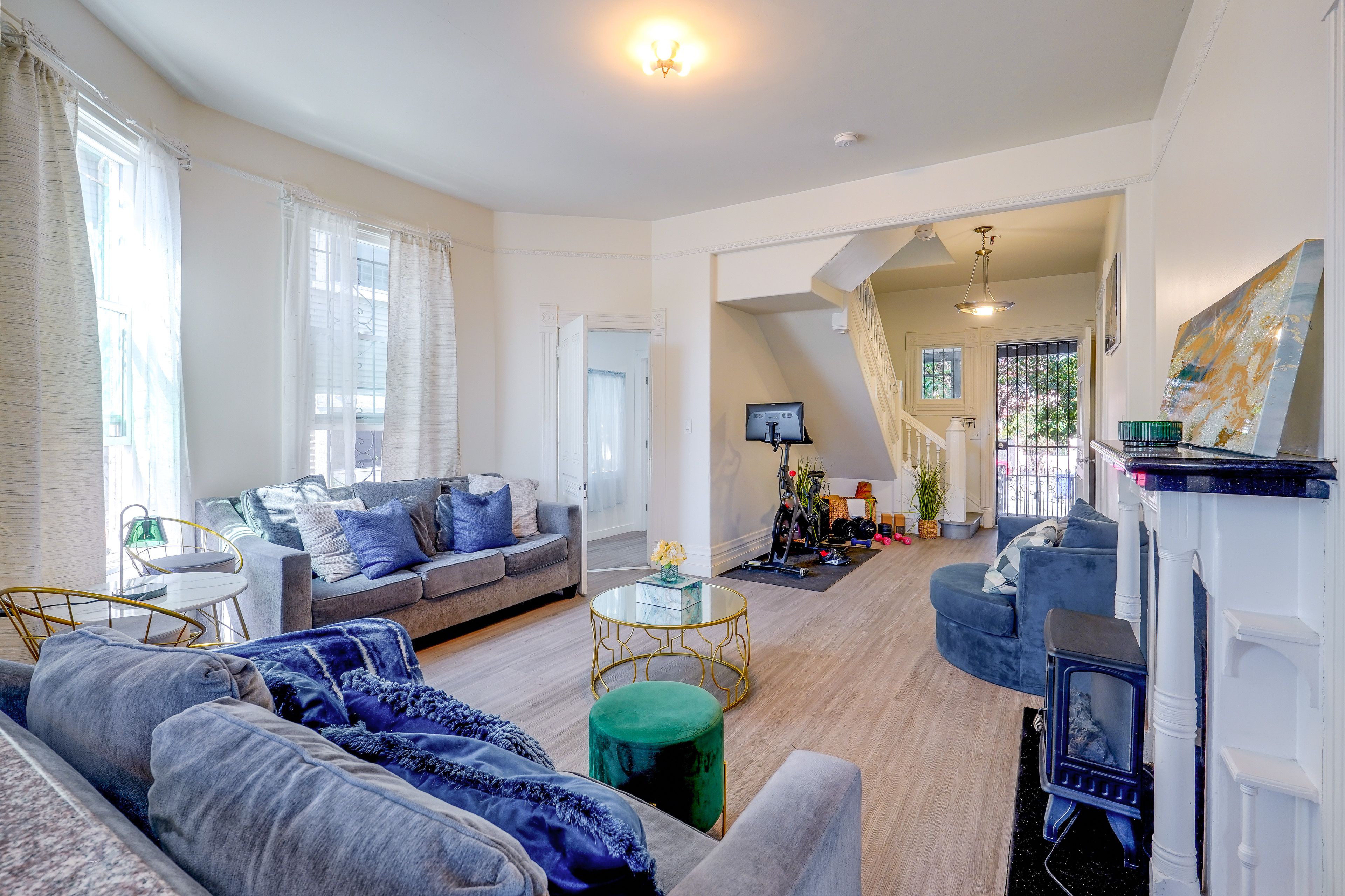 Living Room | Peloton Bike | Weights | Yoga Mat | Main Level