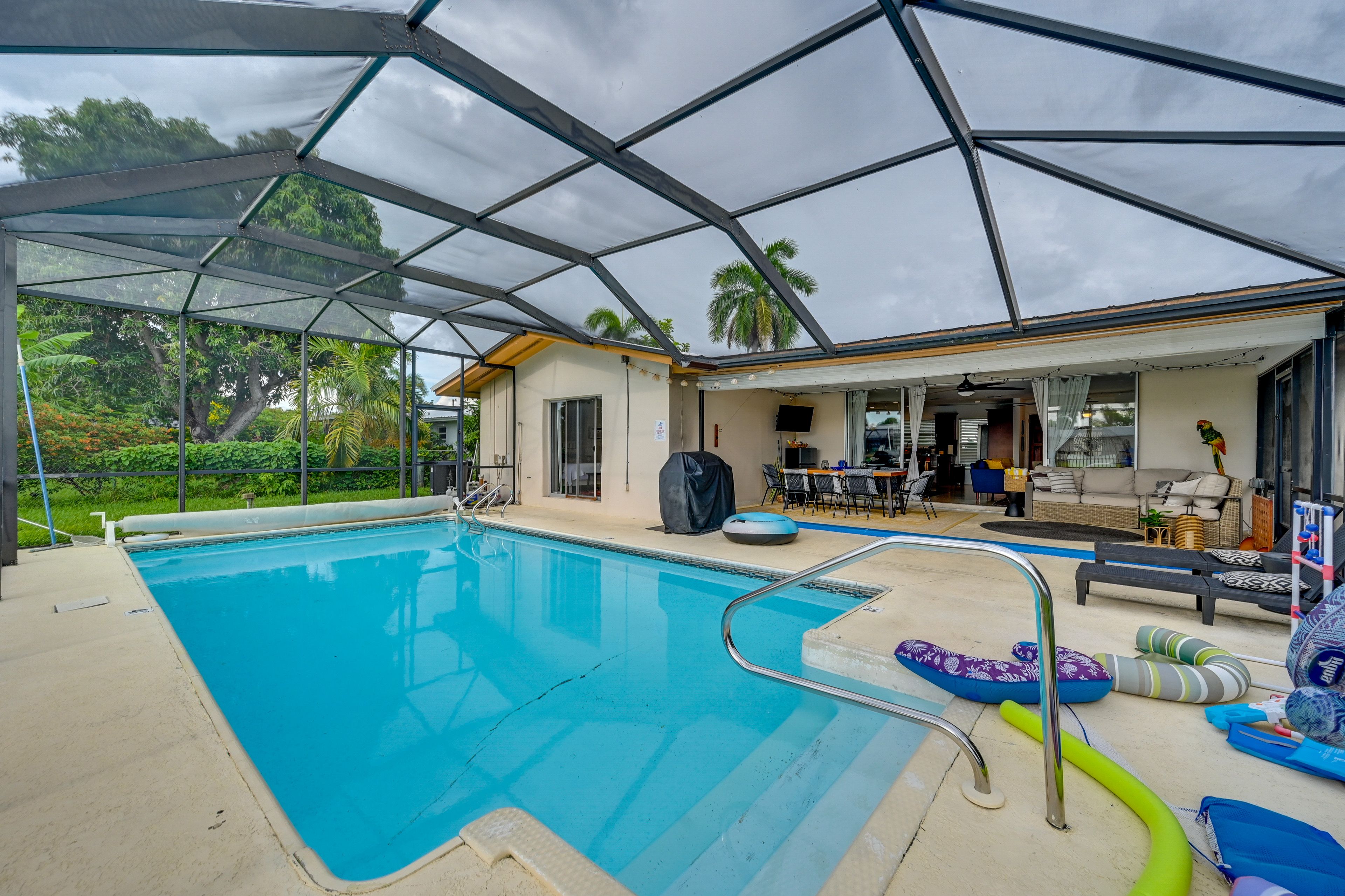 Screened-In Lanai | Private Pool | Outdoor TV & Dining Area | Gas Grill